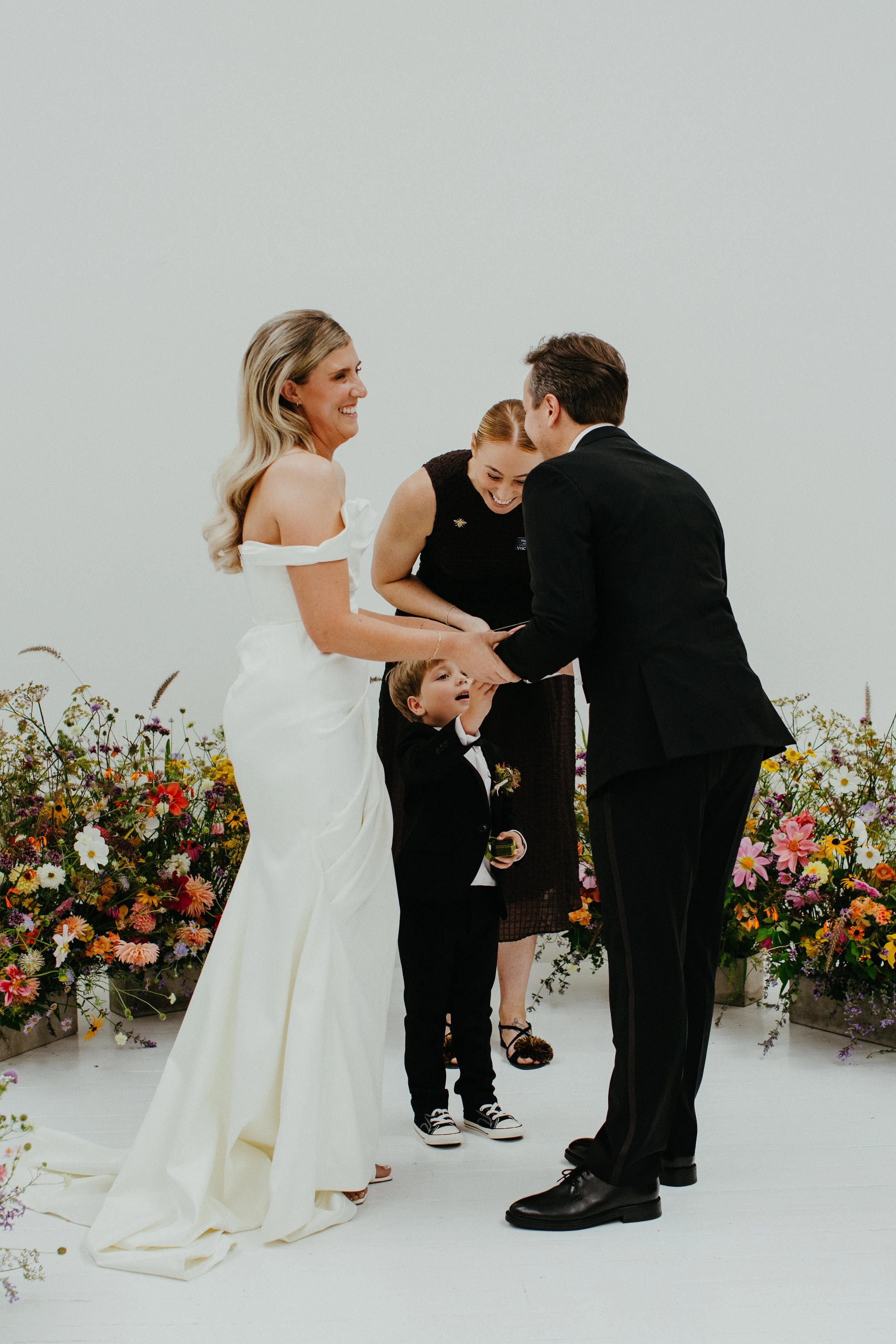 happy couple getting married by Hayley in Manchester
