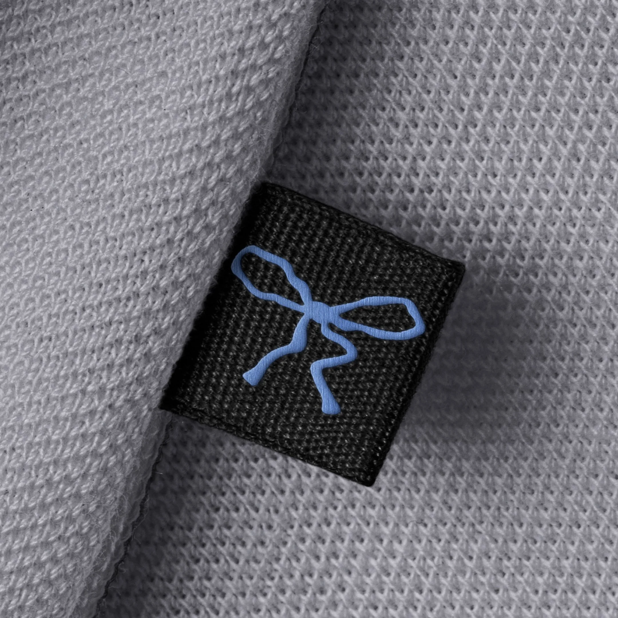 Zoom étiquette tablier fleuriste