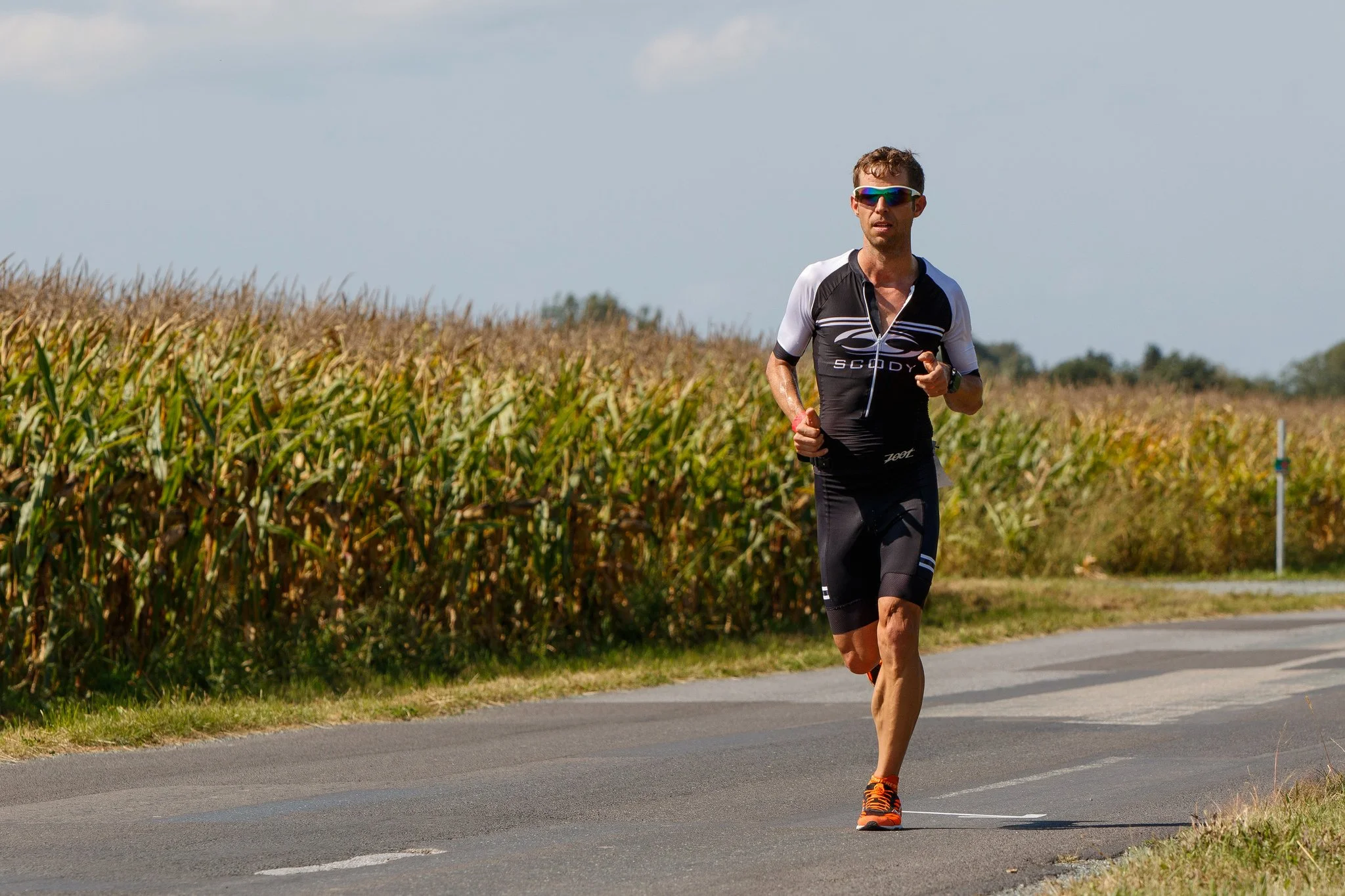 Athlete running on a road