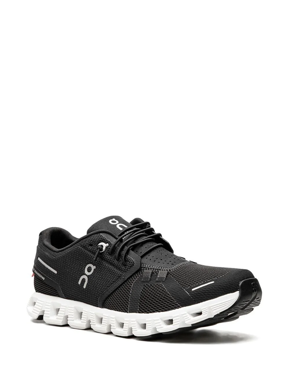 Black and white athletic running shoe with mesh upper and cushioned sole.