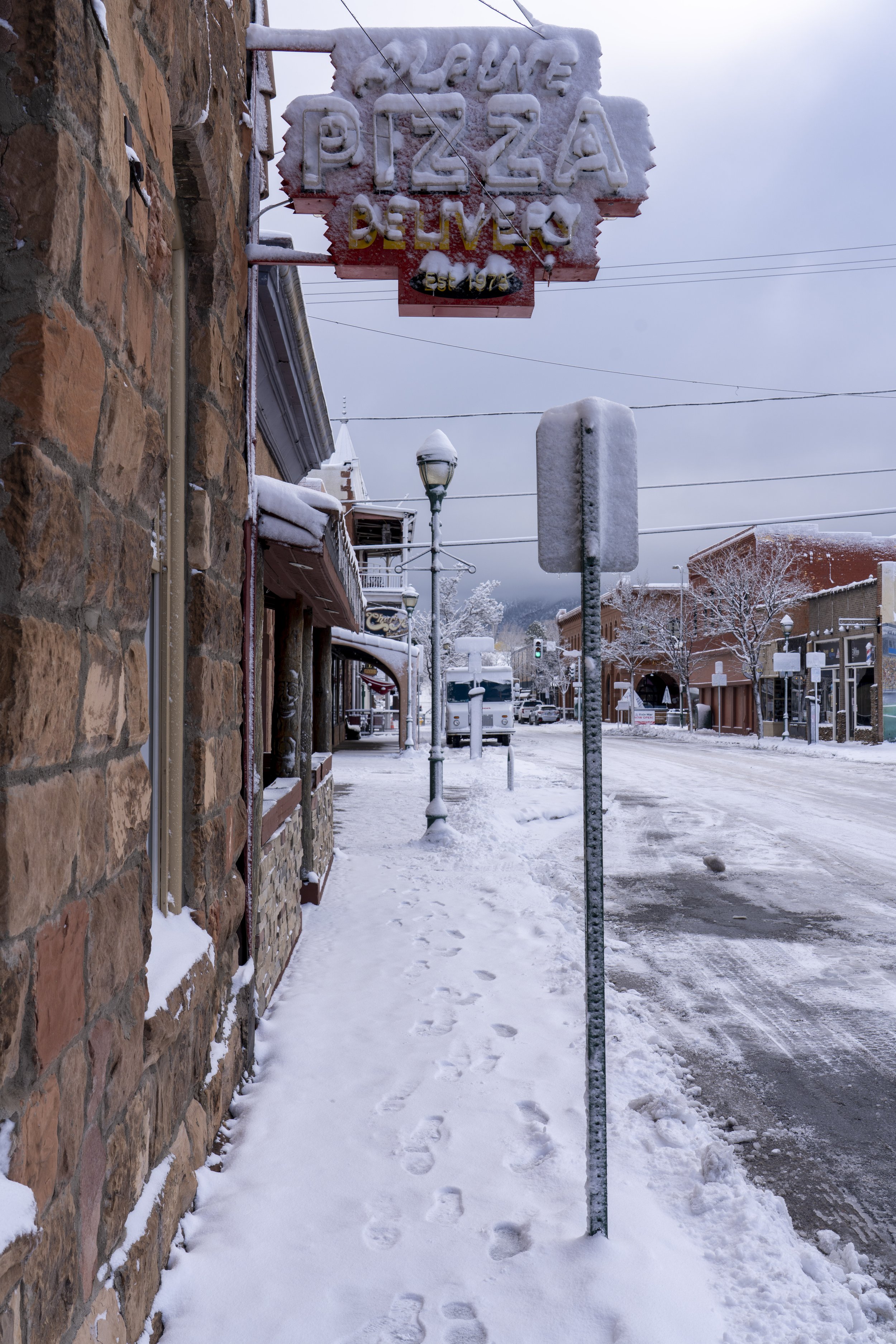 Alpine Pizza (1973) and Hotel Weatherford (1897) with Charly's Pub (1981)