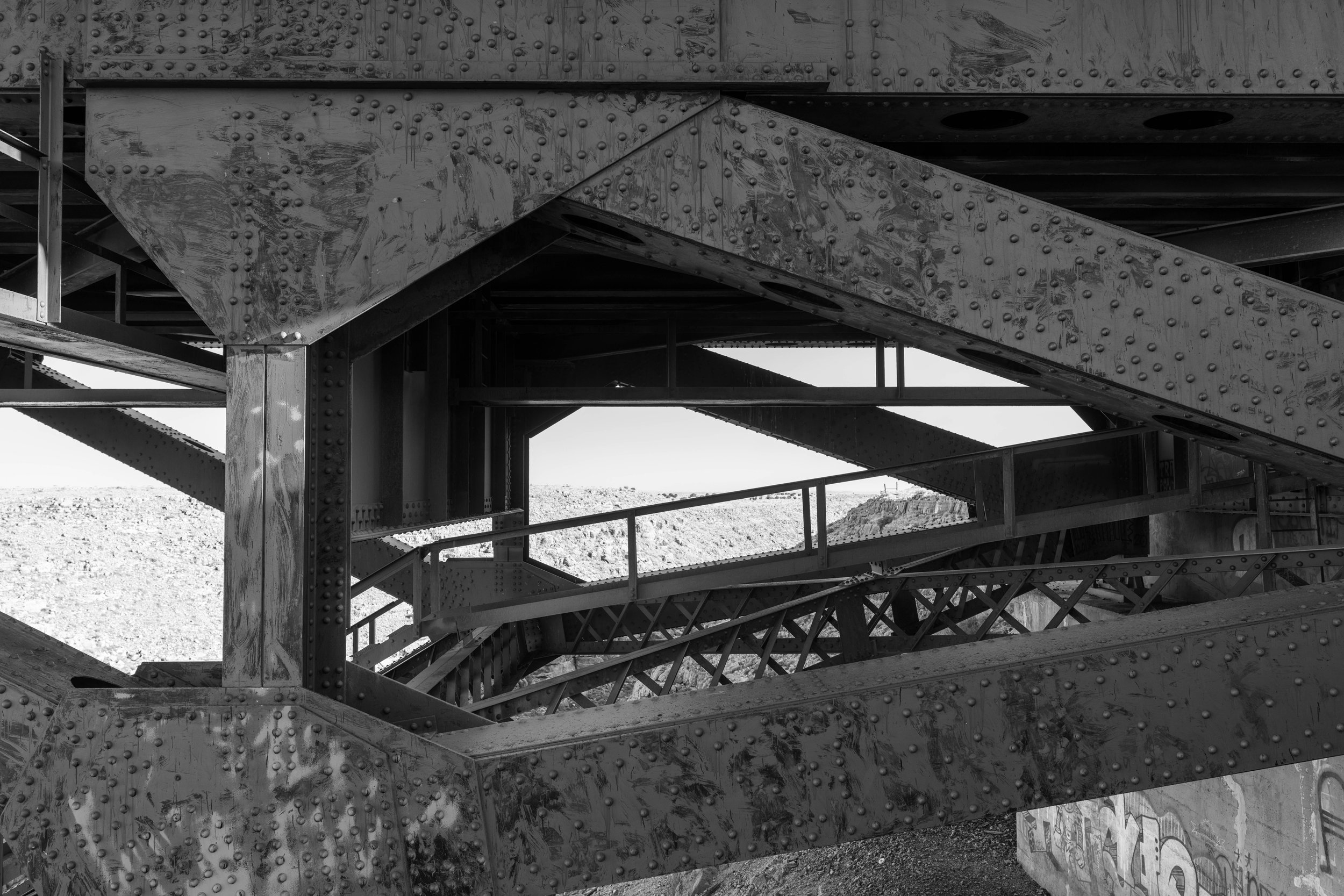 Rivets, mixed paint on bridge