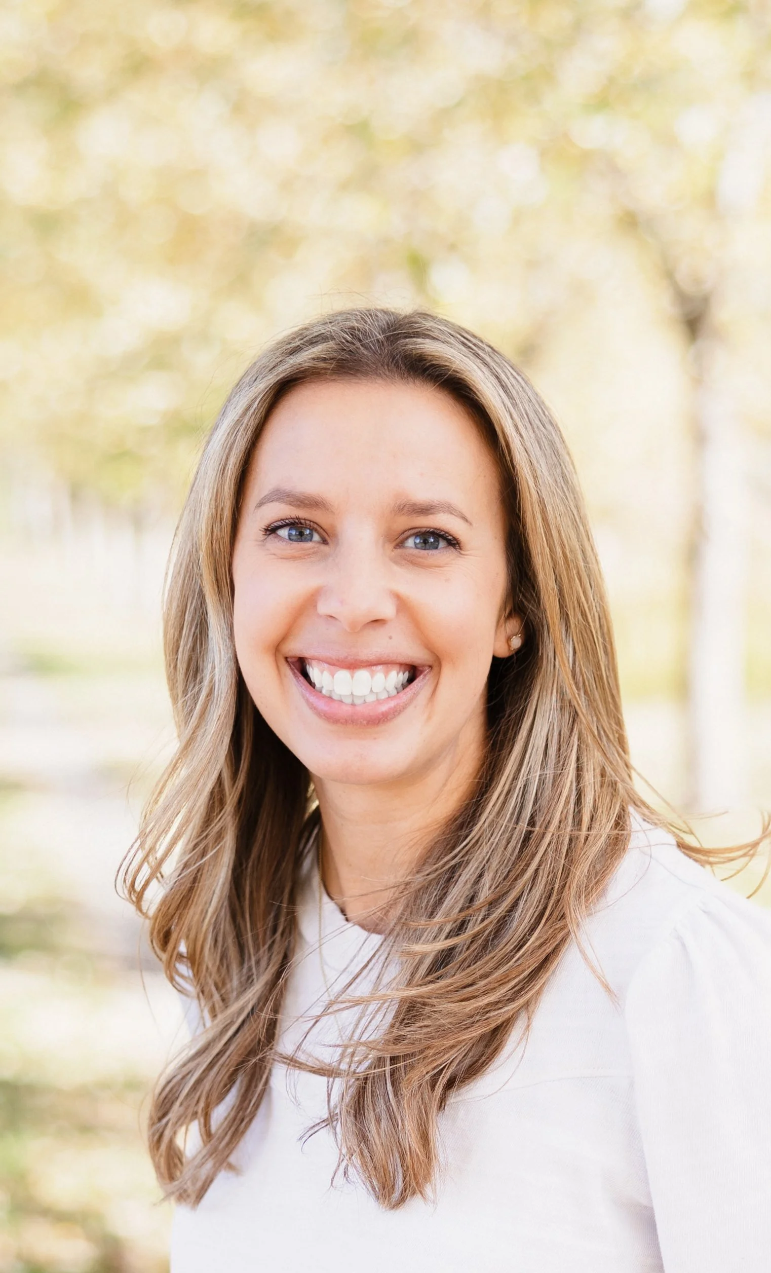 Portrait of Katie Wahal, Board Parent Member at Webster Montessori School, smiling.