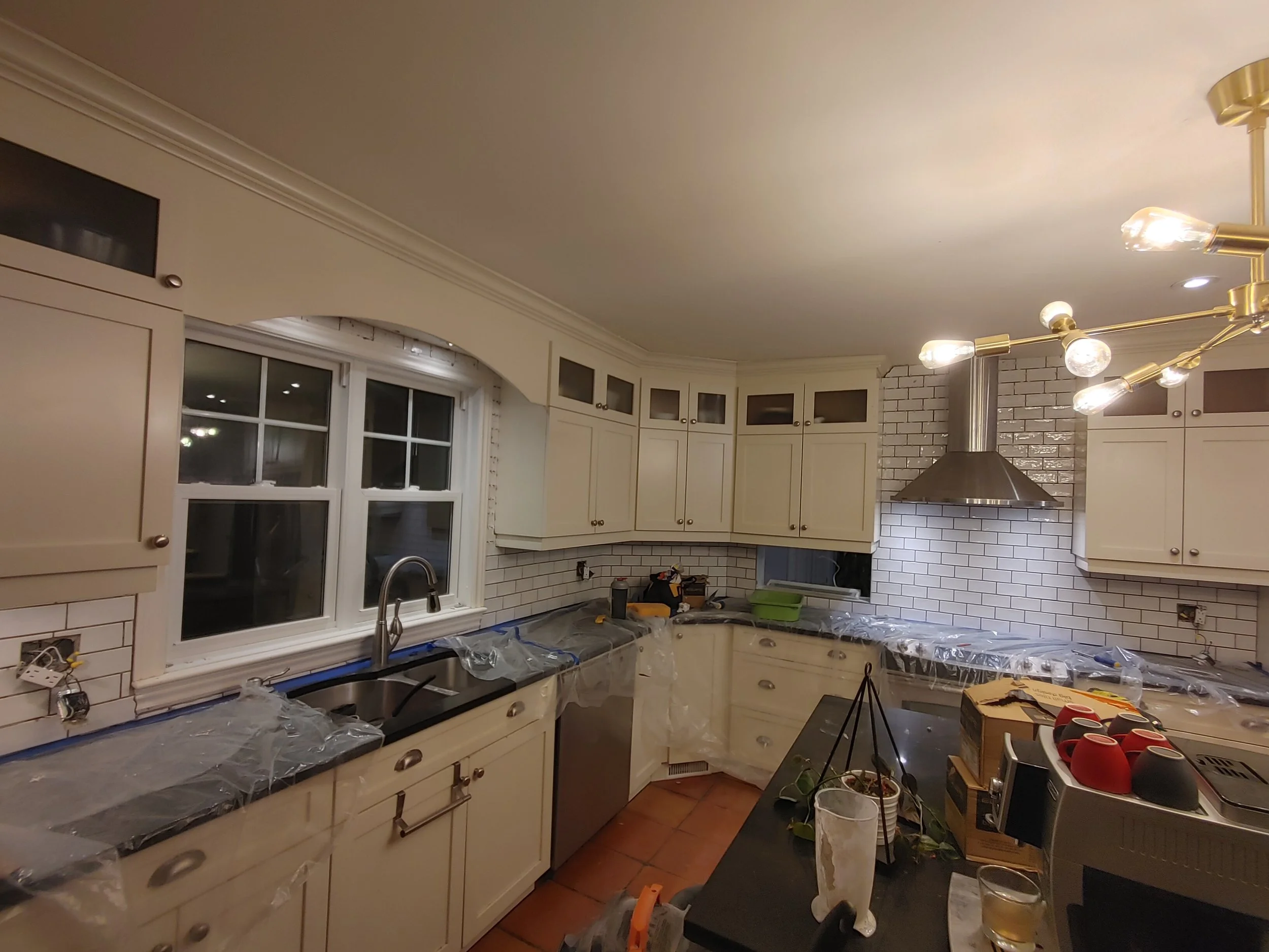 Kitchen Backsplash and Cupboard Install.jpeg