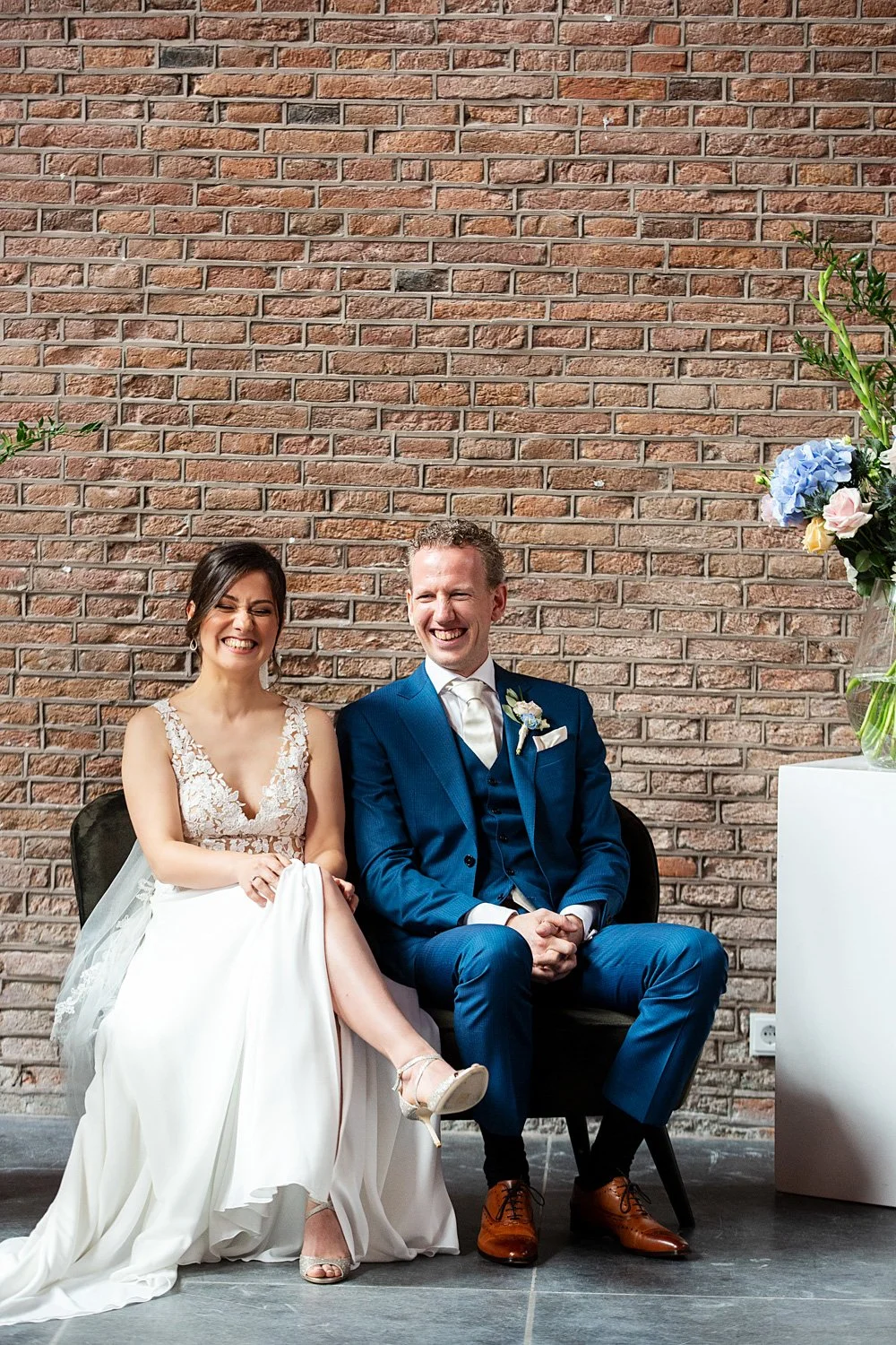 LM572_10-bruidsfotograaf-amsterdam-olofs-ceremonie-bruidspaar-lachend.jpg