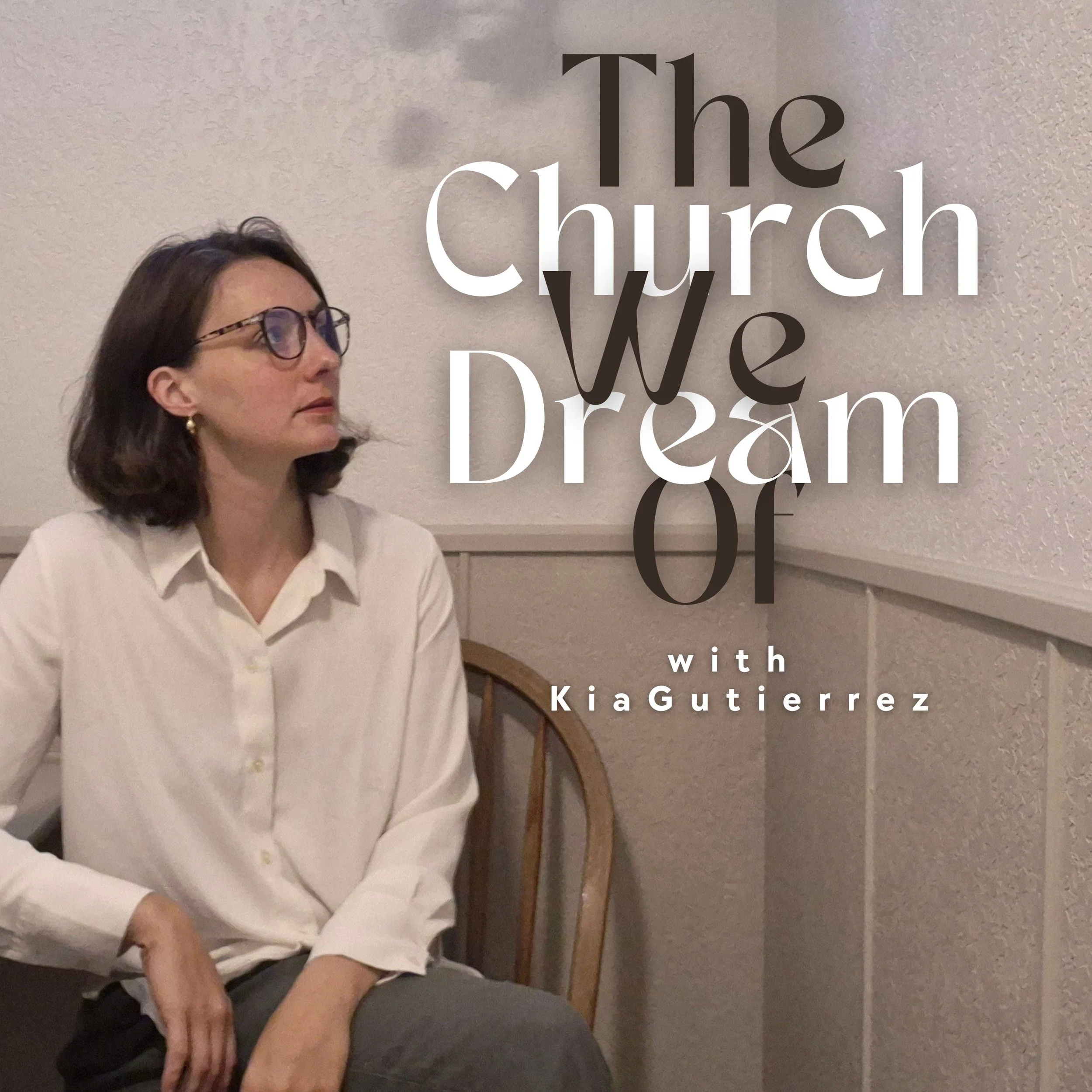 A woman with glasses and shoulder-length dark hair, wearing a white shirt, sitting on a wooden chair in front of a beige textured wall with a gray trim, with large text overlay reading 'The Church We Dream Of' and smaller text 'with Kia Gutierrez'.