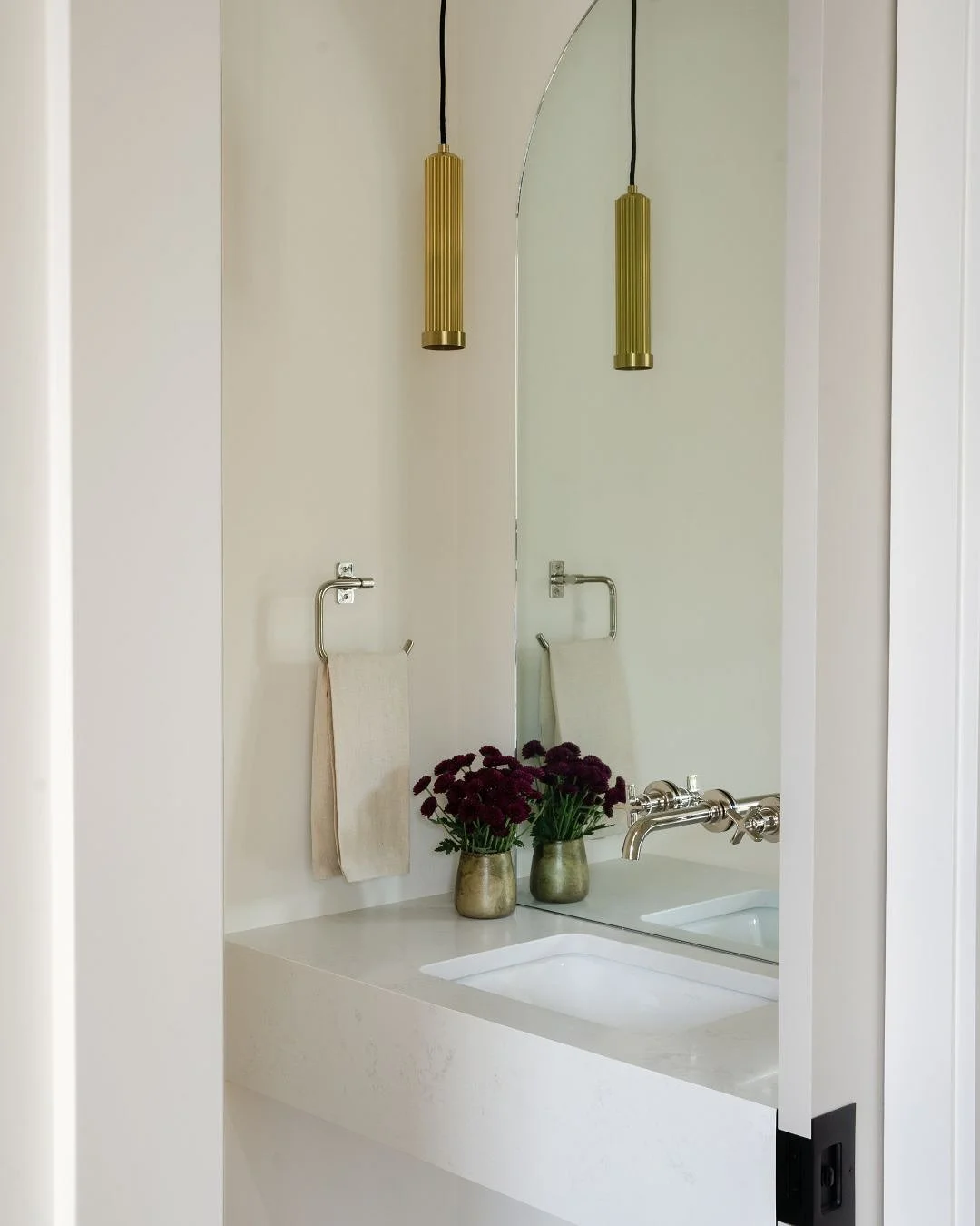 In the powder bath at our #SFSnowflake project, every inch was intentional.  From the custom quartz vanity to the simple mirror designed to reflect both light and style. Proof that scale doesn&rsquo;t limit design.

Photography: @legaciestudios