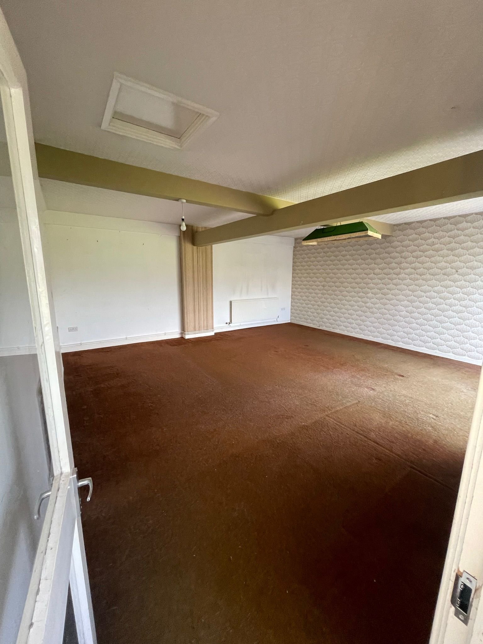 Before: this is (currently) a badly converted garage.