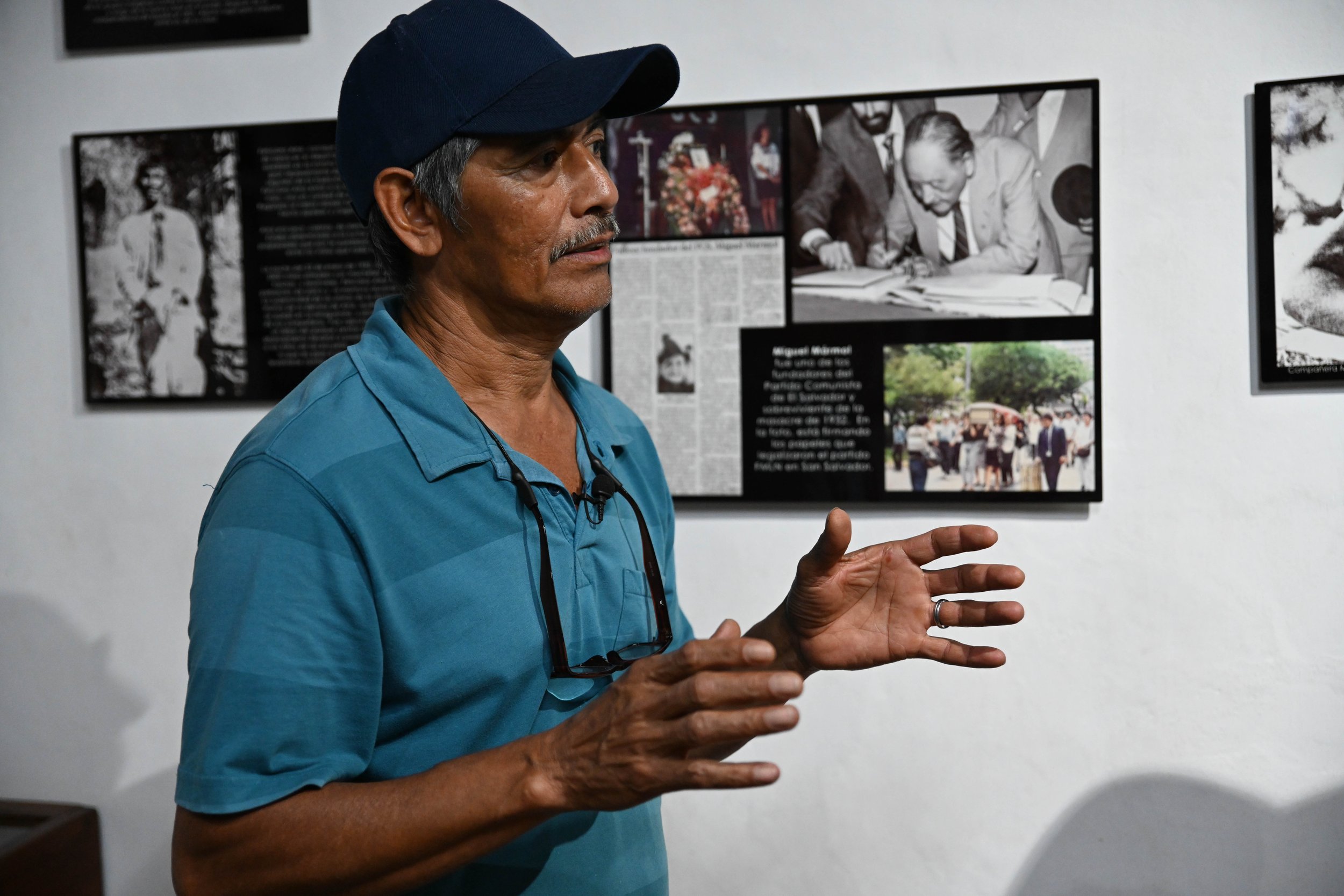 man speaking in museum