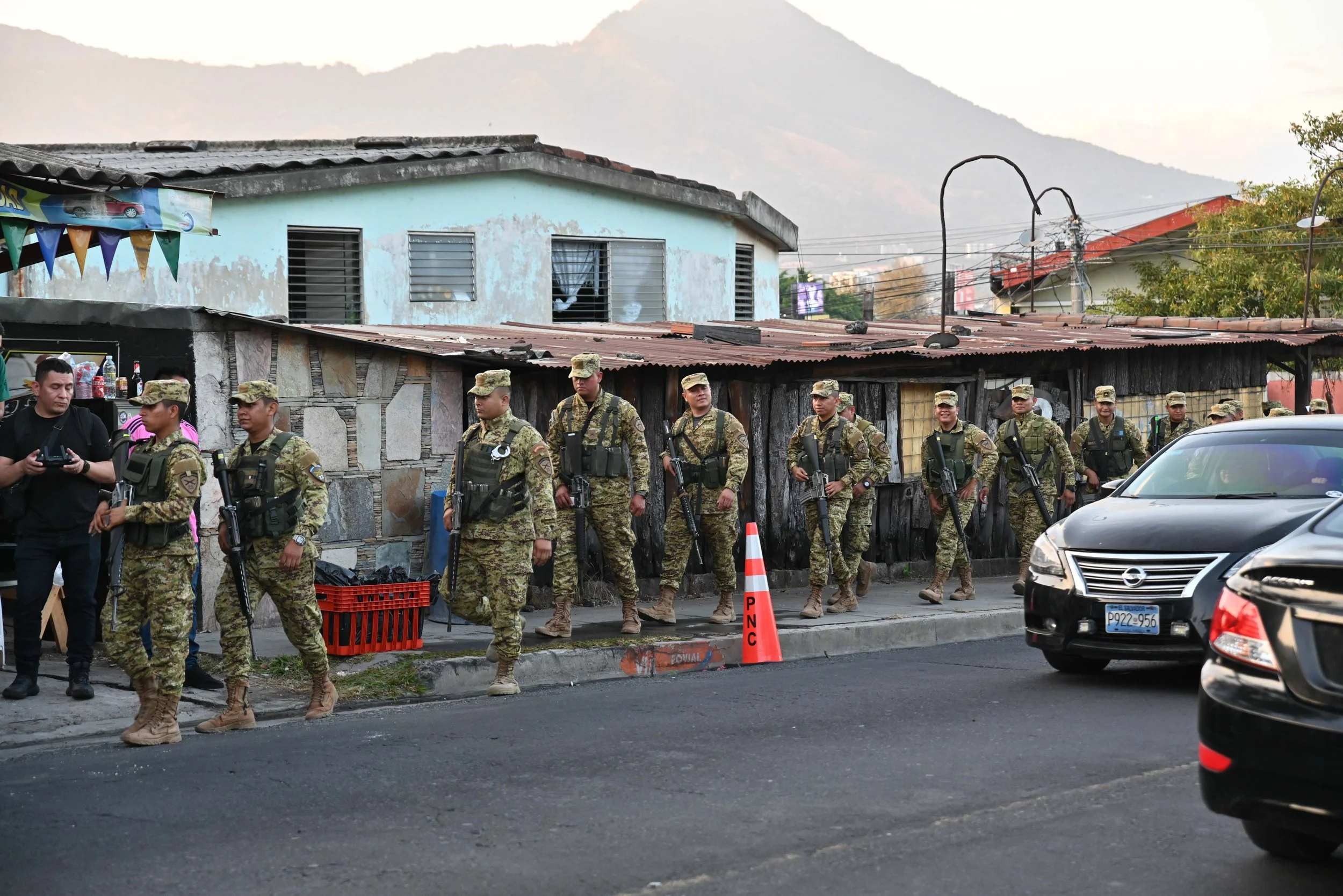 military walking through Salvadoran streets