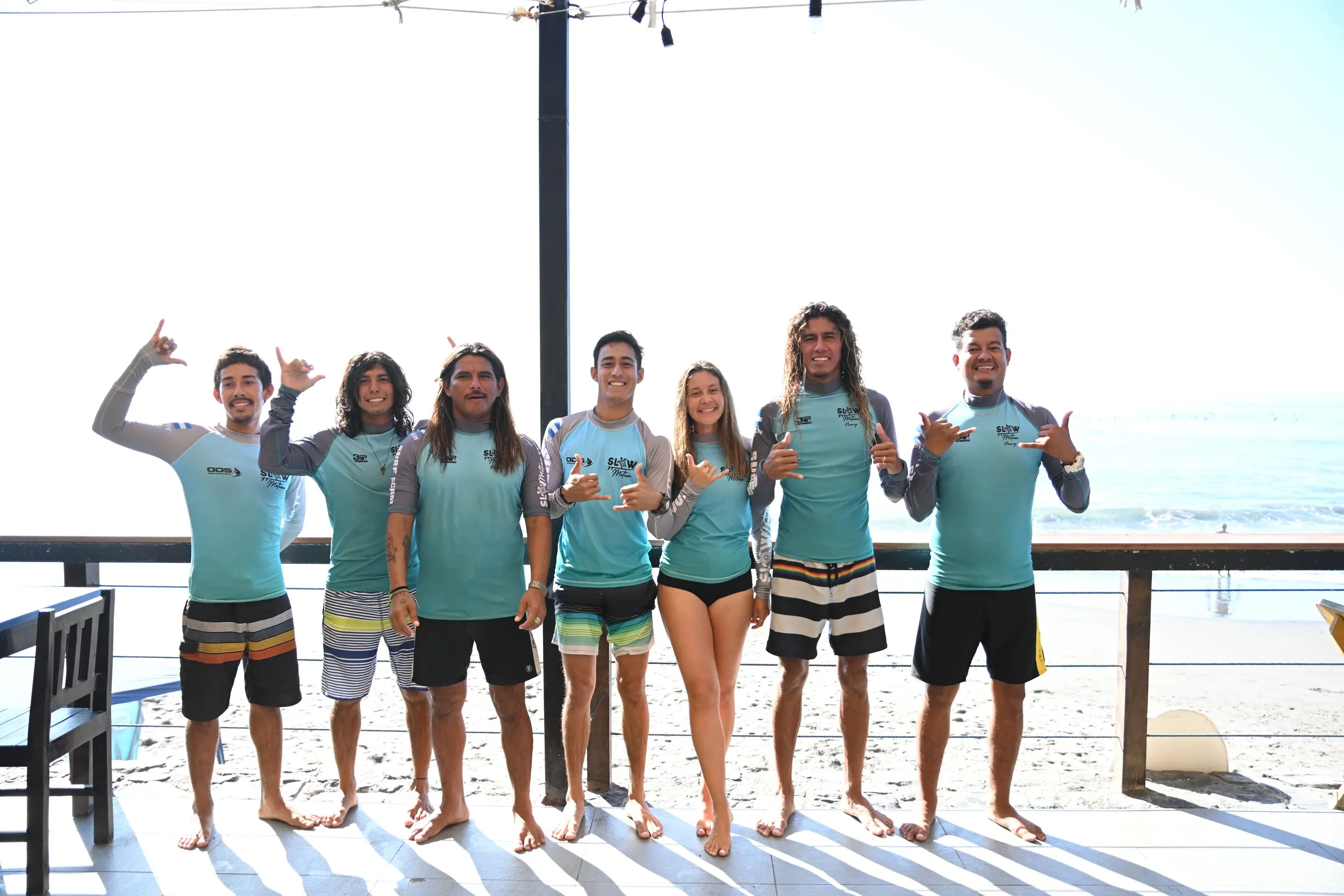 group of surfer posing