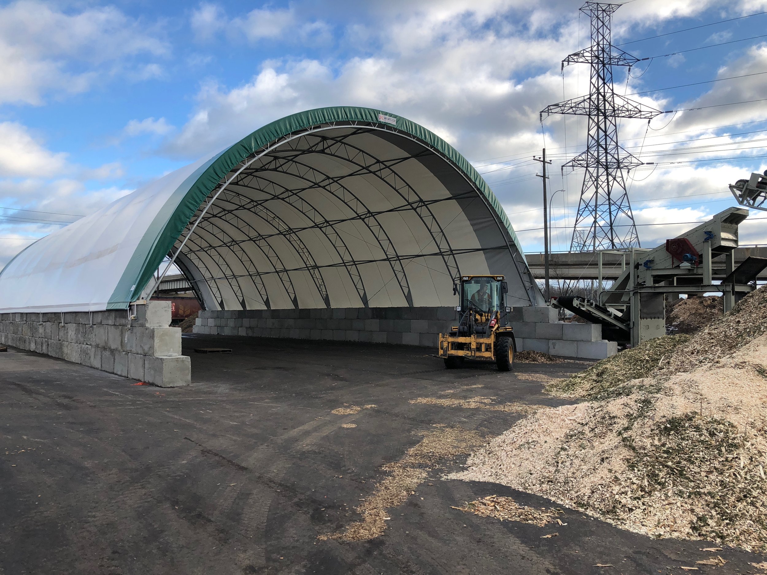 Arborist waste chips to heat