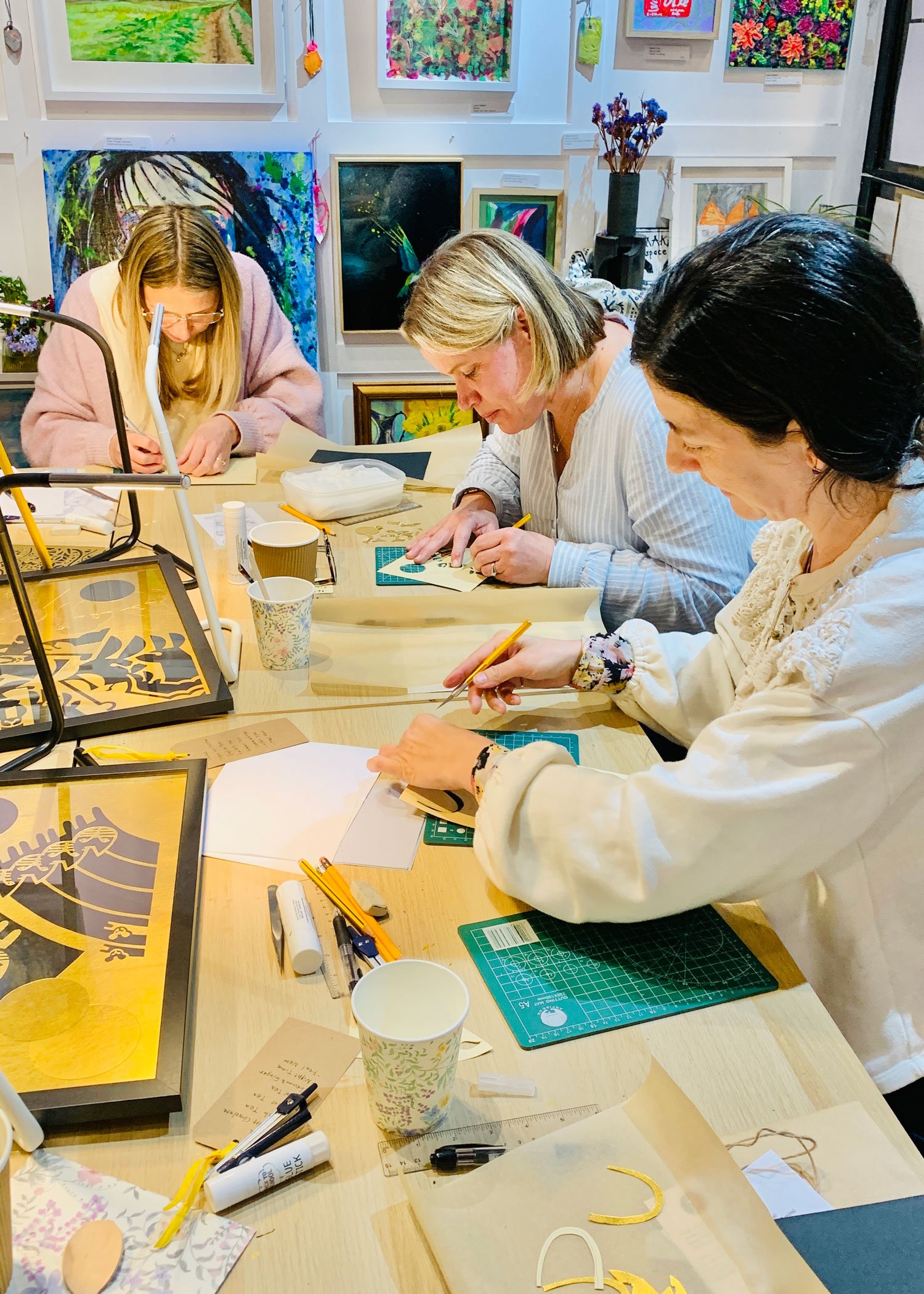 yoshie allan's art workshop image - attendee's artwork  in progress at papercutting session at Make Space Studio Gallery, Hitchin Hertfordshire UK.