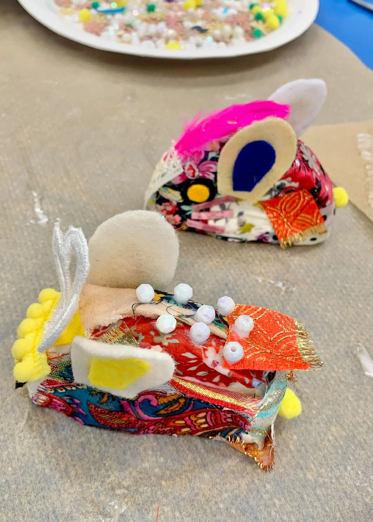 yoshie allan's art workshop image - one of attendee's artwork of kids fabric collage easter bunny, at North Hertfordshire Museum, UK.