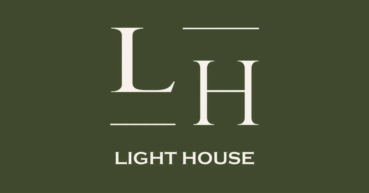 Logo with the letters 'L' and 'H' above the words 'LIGHT HOUSE' on a green background.