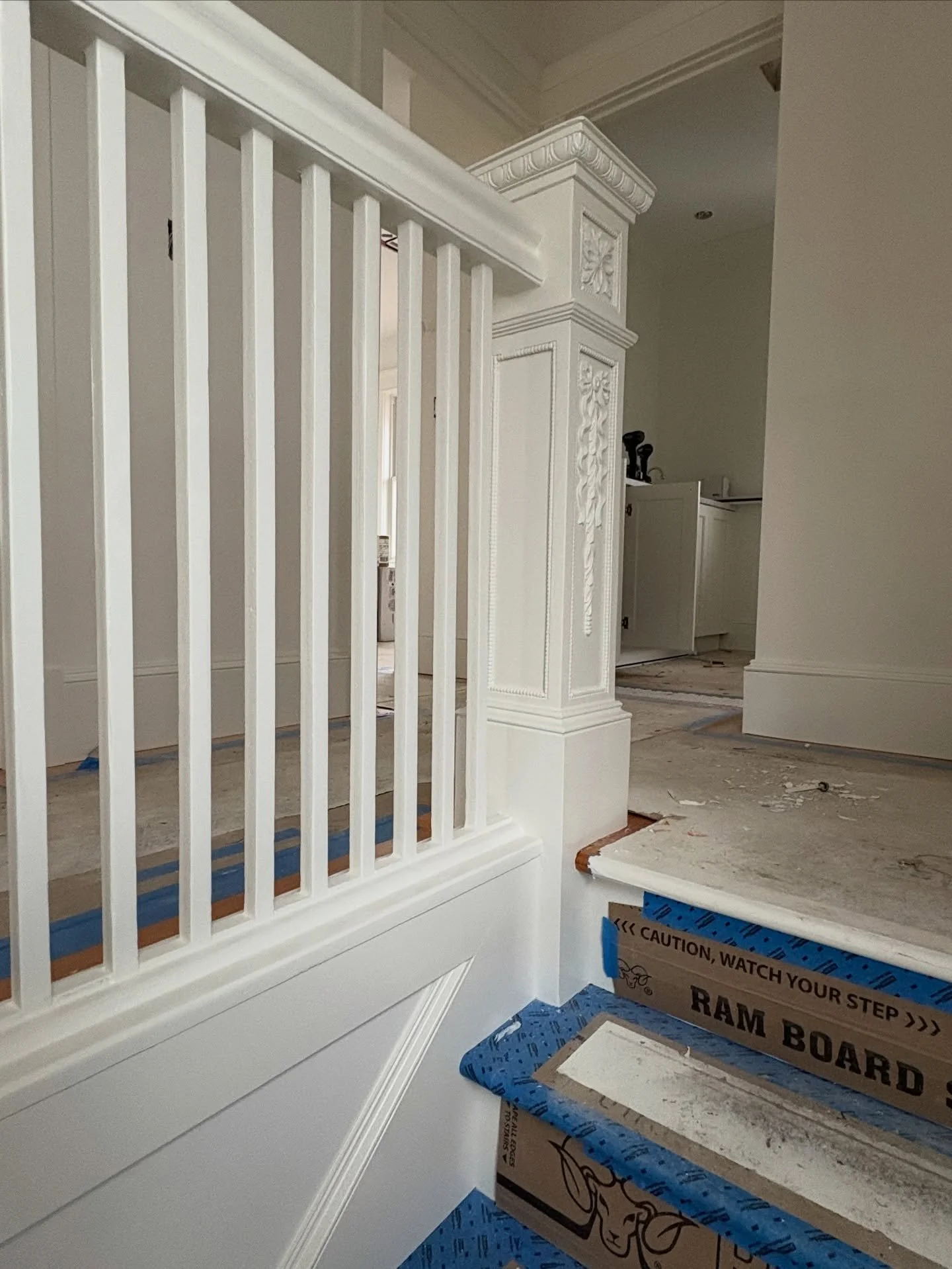 The railing survived the fire, and the owner decided it was worth keeping. For the most part, the assembly was still intact and only required fastening. I reset the post and repaired what was lost&mdash;ongoing work at the Queen Anne house. 

Real wo
