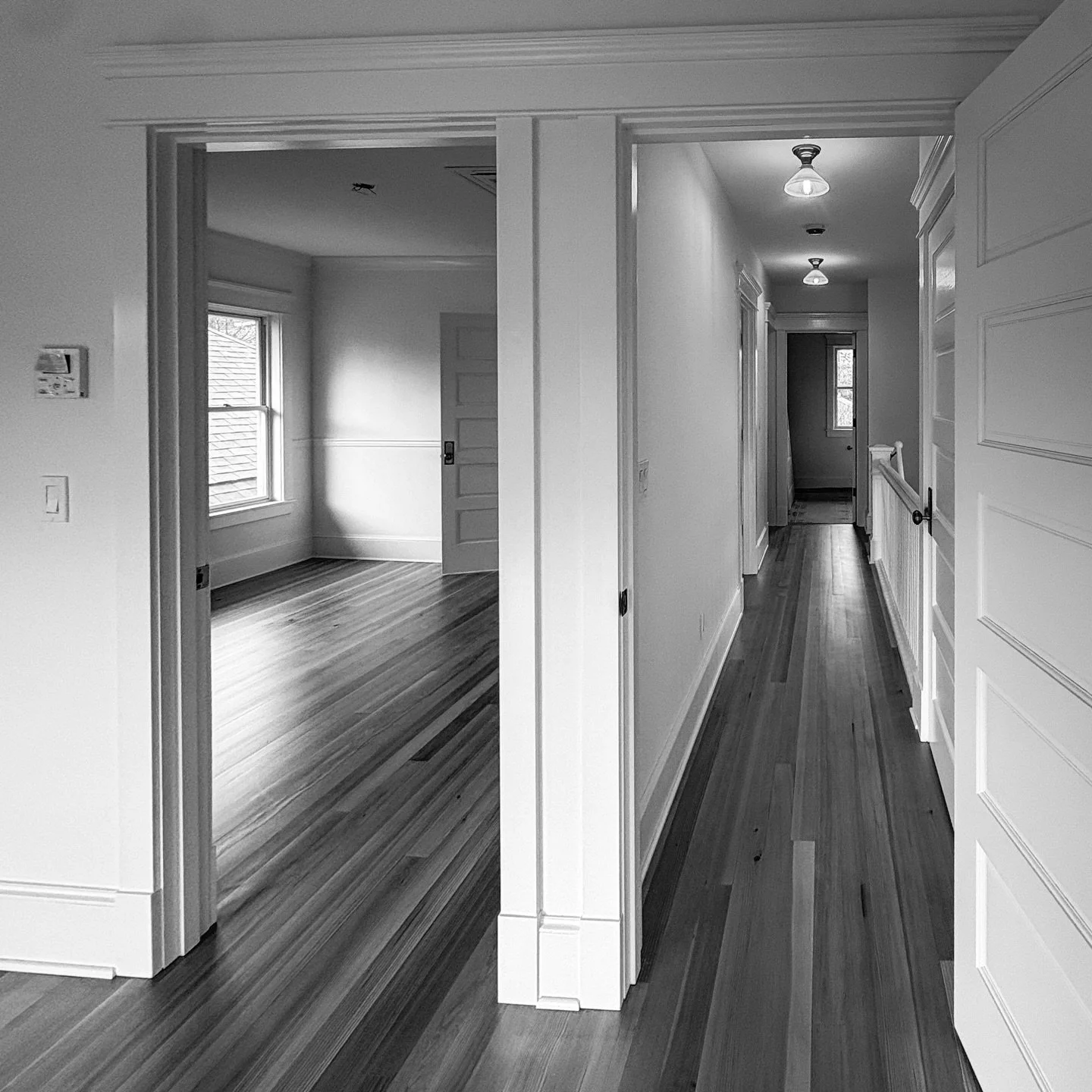 Baseshoe installed throughout, and BOAXEL wardrobe installed per client preference.