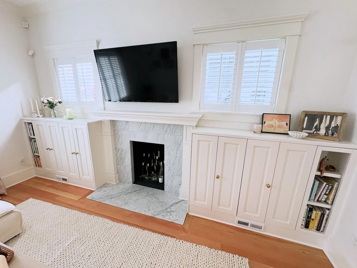 Finishing accents on the fireplace.

Cabinets, millwork, hardware, baseshoe