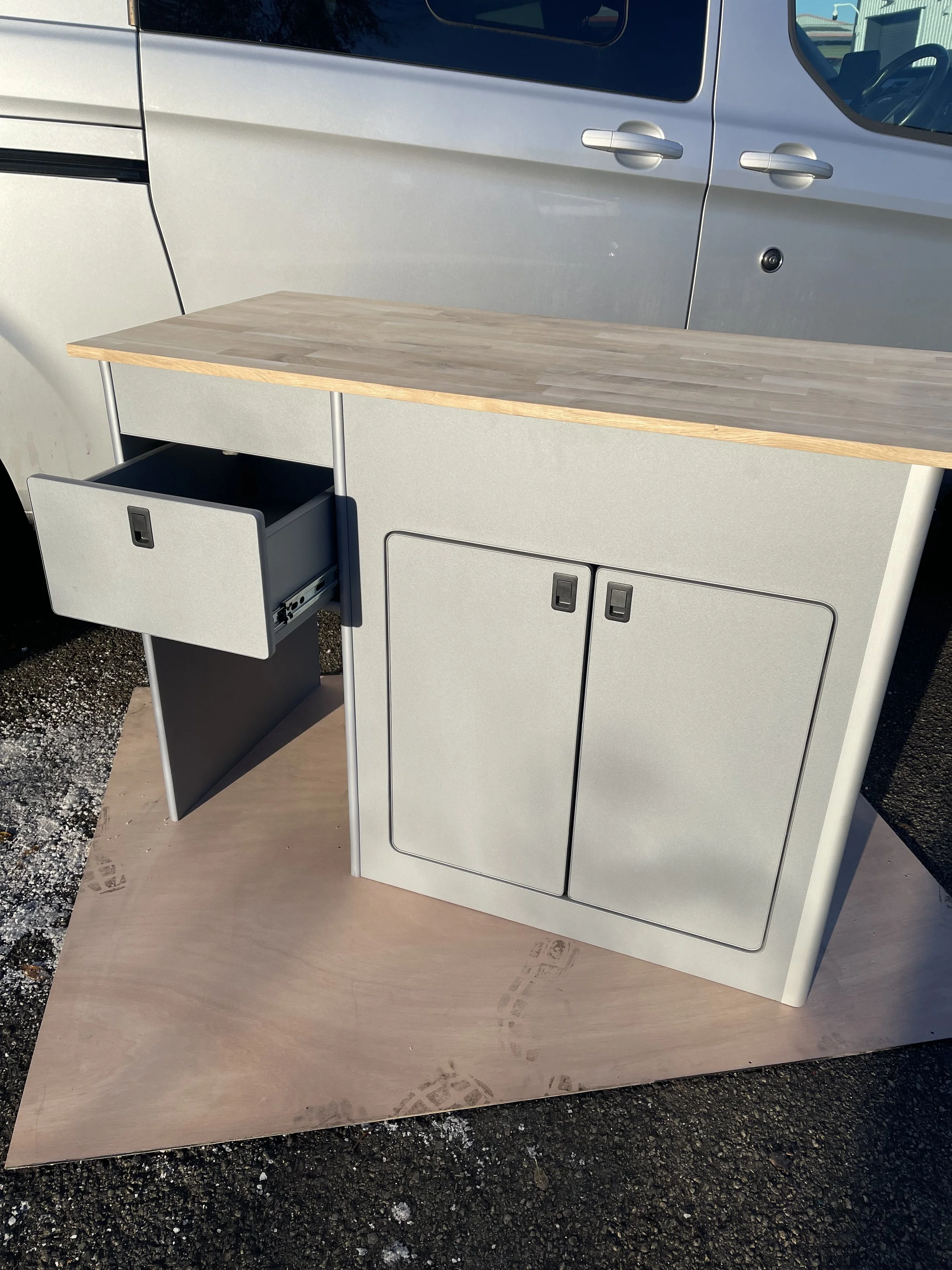 Camper van pod in light grey with oak worktop 