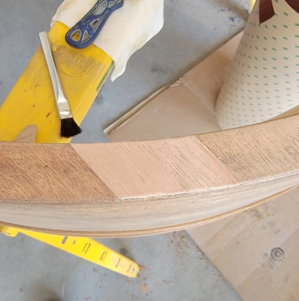 Taking a break from building cabinets today to work on the grand piano bookcase that my Dad and I are working on.  Today I'm working on patching some damaged veneer.  Also had some wood that was damaged on a small section on the edge so I'm having to
