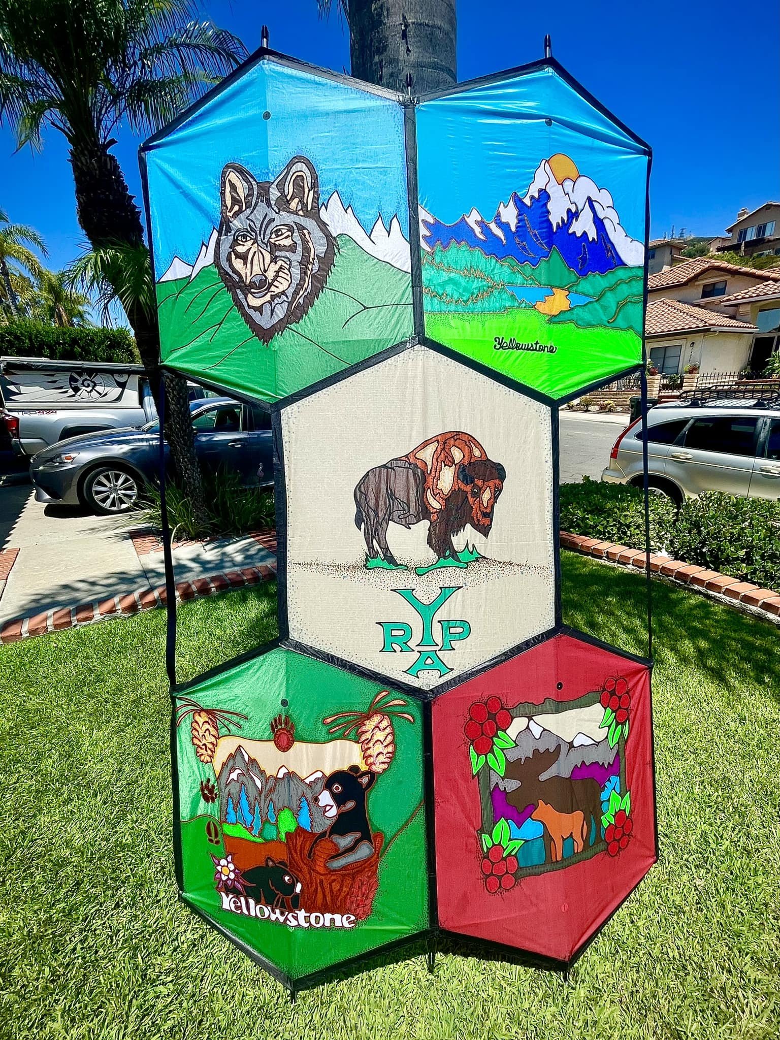 . Jose Saintz San Diego, California. “Animals of the Yellowstone”
Many years ago Jose bought some ceramic tiles when visiting Yellowstone Park. Jose’ adapted the striking animal graphics for use on his YRPA kite. All of the animal figures