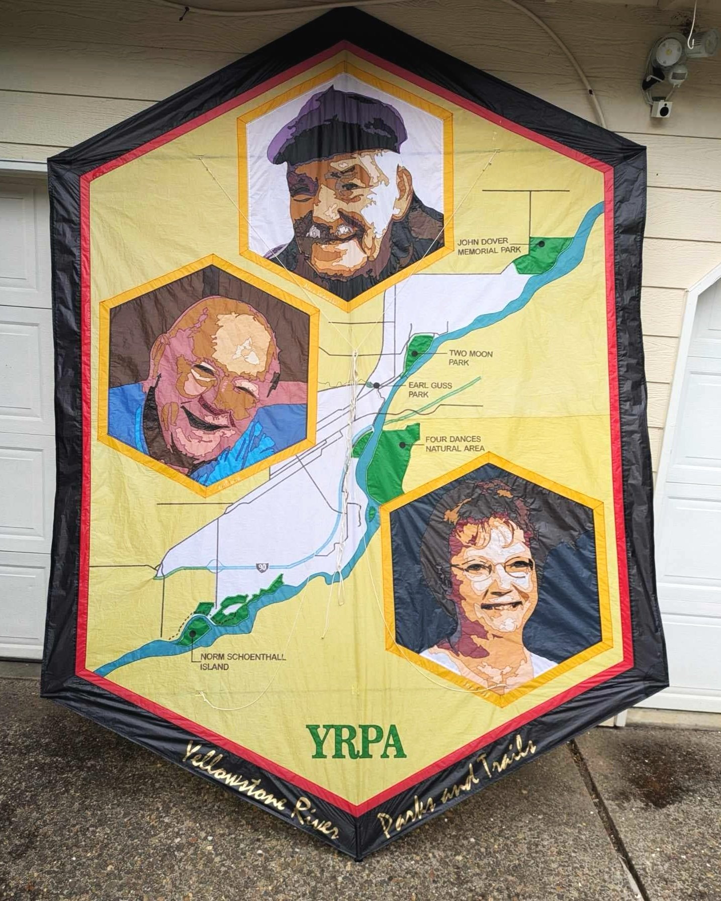 Ron Bohart. Tigard, Oregon. “The Founders of YRPA”
Ron’s wonderful ability to put lifelike portraits of people onto kite fabric was recognized in his 10’ rokkaku that features three of YRPA’s founders: Norm Schoenthal, Jean Smith and Earl Guss. The