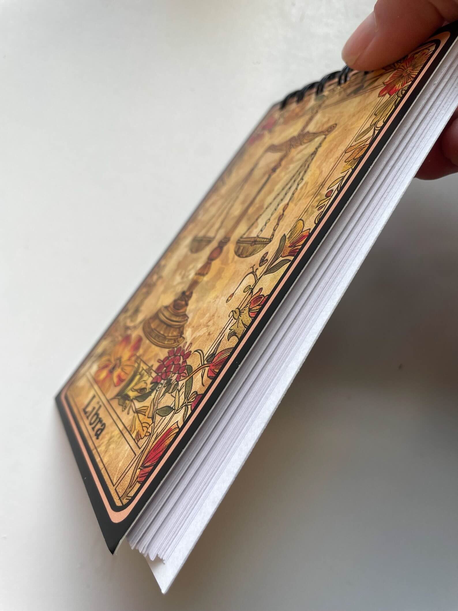 Libra Notebook side view.jpeg