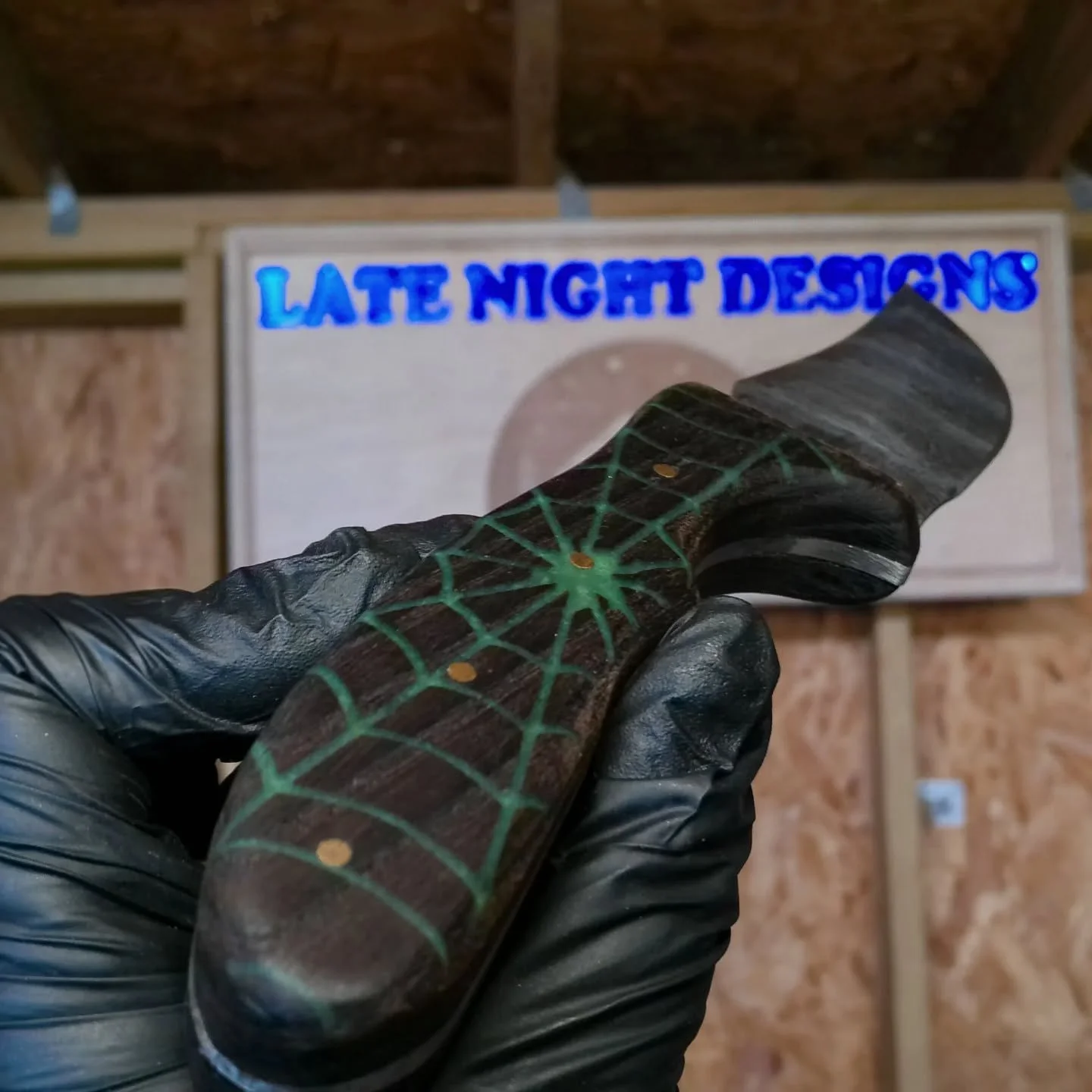 New knife finished! 

The green epoxy spider web handle was a blast to create. I designed the pattern, the CNC cut it out perfectly, and I finished the shaping and sealing.

​Love the final result. I'll be making a few more knives available soon.

​L