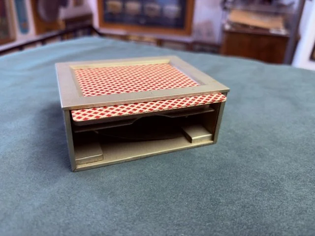 A vintage gaffed faro dealer's box. For more details on current and historical methods of card cheating, see Andrew Wimhurst's book "Thieving Bastards".