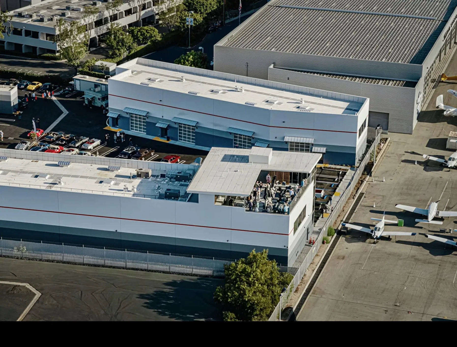  Finish Line Auto Club in Costa Mesa recently opened its rooftop bar and pavilion. (Courtesy of Finish Line Auto Club) 