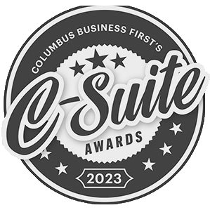 Gray circular logo for the Columbus Business First C-Suite Awards 2023, featuring stars and bold text.