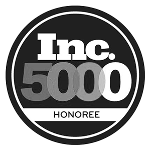Inc. 5000 Honoree badge with black and white design and gray accents