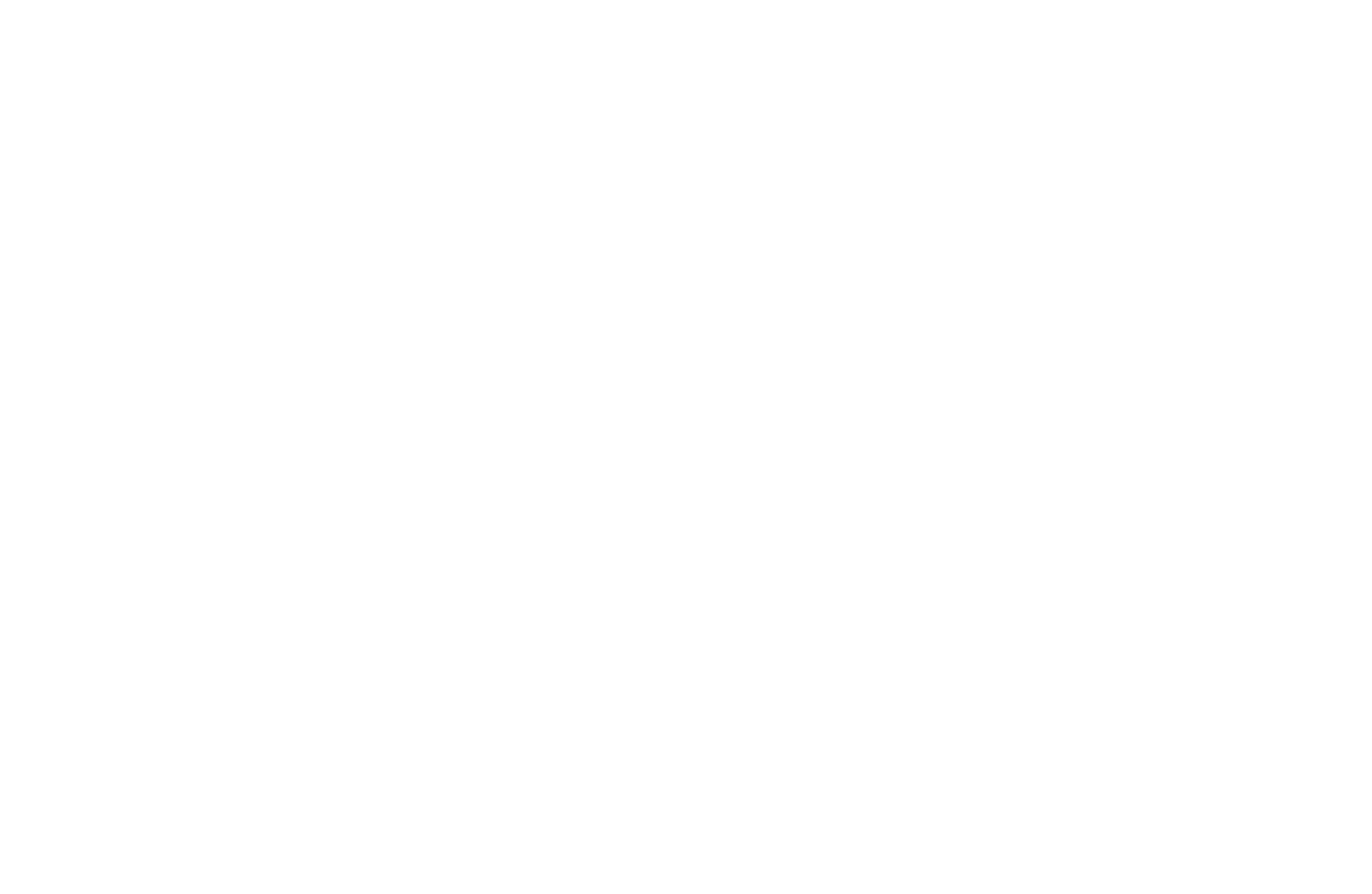 Silhouette of a rocket launching with smoke trail on a black background.