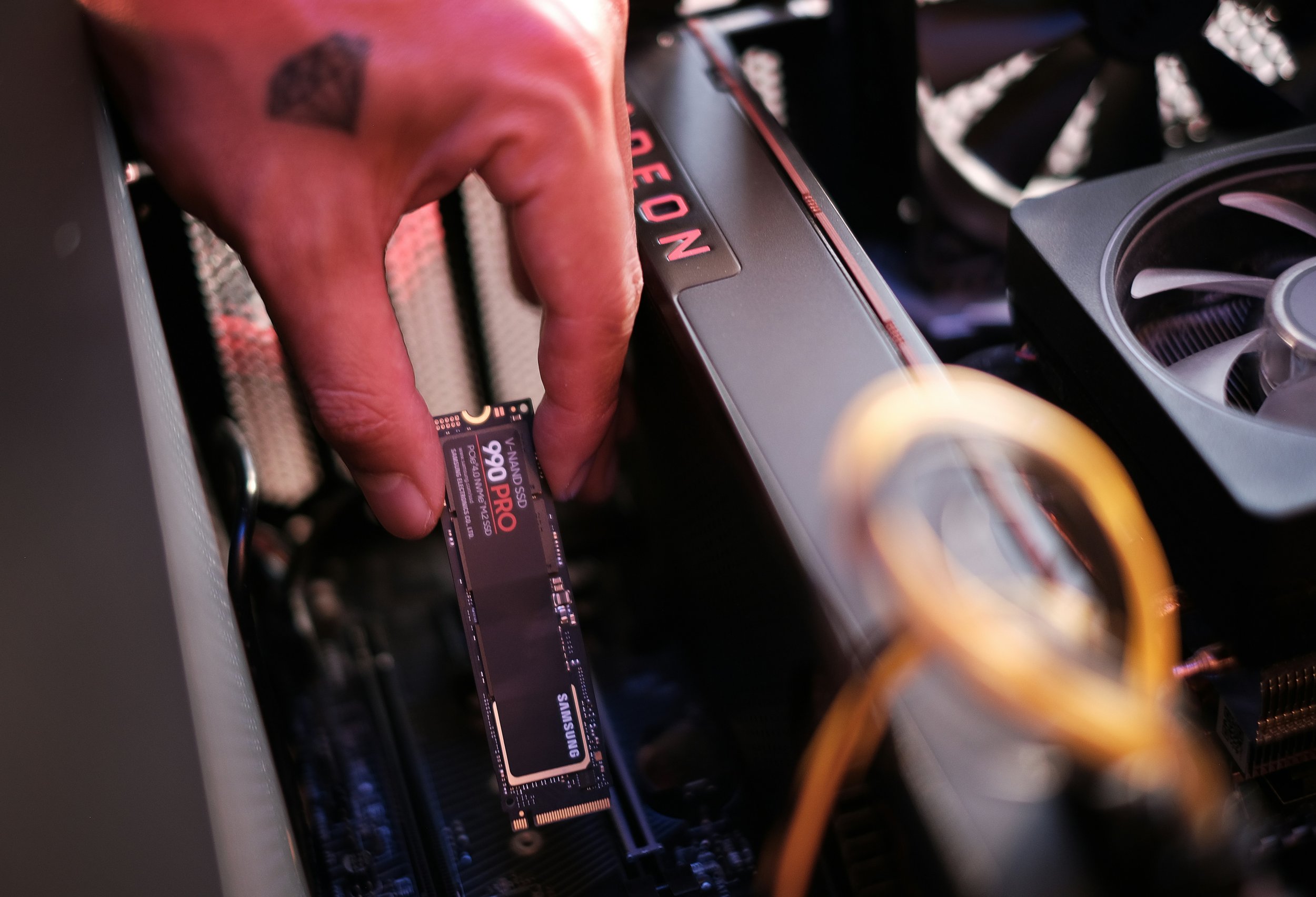 Technician installing an SSD upgrade in a laptop at Rocket Squad Portland