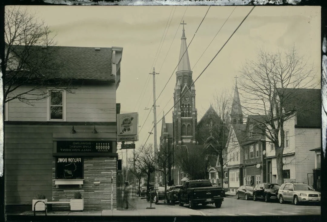 Five seconds of a Clarke Street view captured in my 2x3 camera and developed after exposure at the old Riverwest co-op building on 2/22/26.