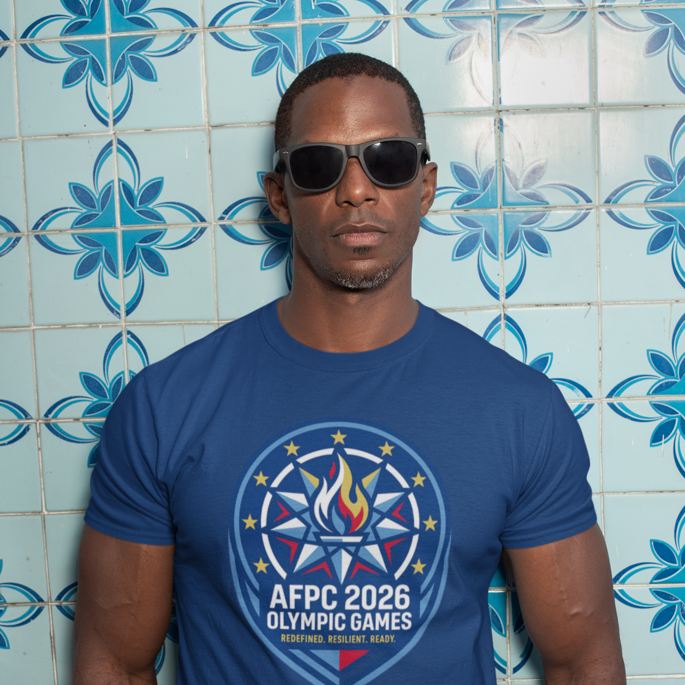 t-shirt-mockup-of-a-man-with-sunglasses-against-a-blue-tiling-30449.png