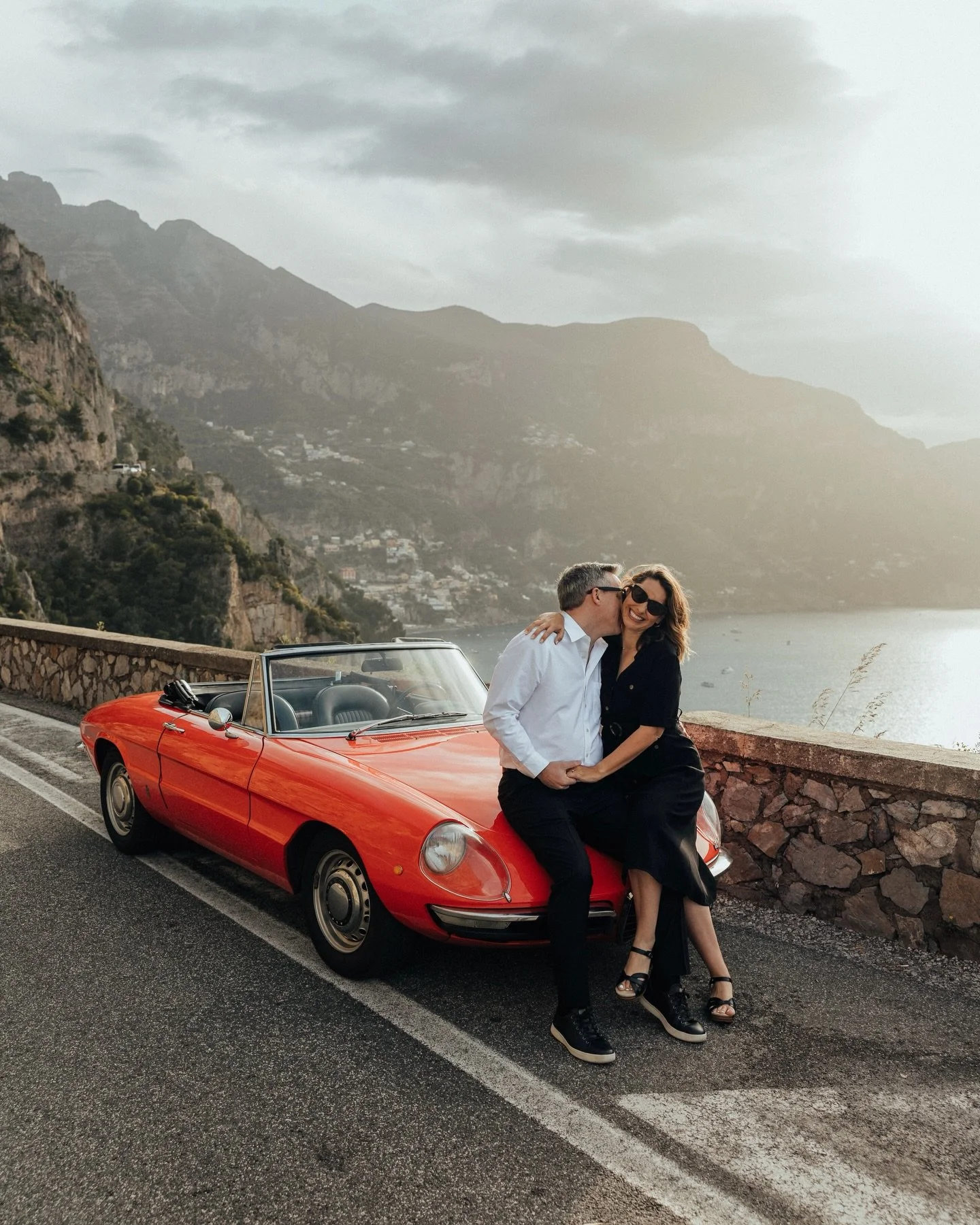 Bryan and I celebrated our honeymoon in Italy, and while we were in Positano, we had the sweetest time working with @amalfitana_photographer to capture a little piece of our time there.

Add in @positanovintage and this incredible first edition Alfa 