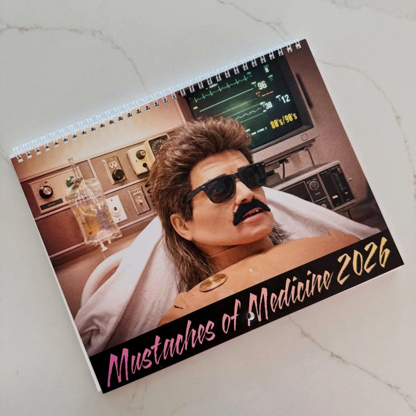 Happy New Year! 🎆 
New Year, New Calendar! Check out our 2026 Mustaches of Medicine Calendar - our theme this year is &ldquo;80s/90s Nostalgia&rdquo;. 🗓️🥸 Stay tuned throughout the year to see each month&rsquo;s feature!