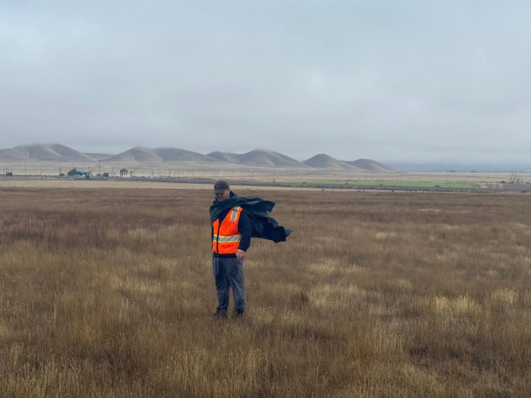 When you're trying to look cool and contemplative in the field, but the wind has other plans for your &quot;cape.&quot; &zwj;At BCR Consulting, our cultural resource specialists are always ready to battle the elements (and sometimes their own wardrob
