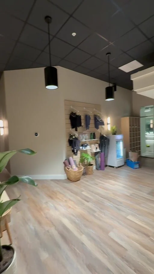 A welcoming lobby and tea station at Be Yoga Federal Way.