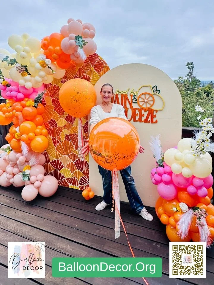 balloon-decor-orange-pink-main-squeeze-baby-shower-setup.jpg
