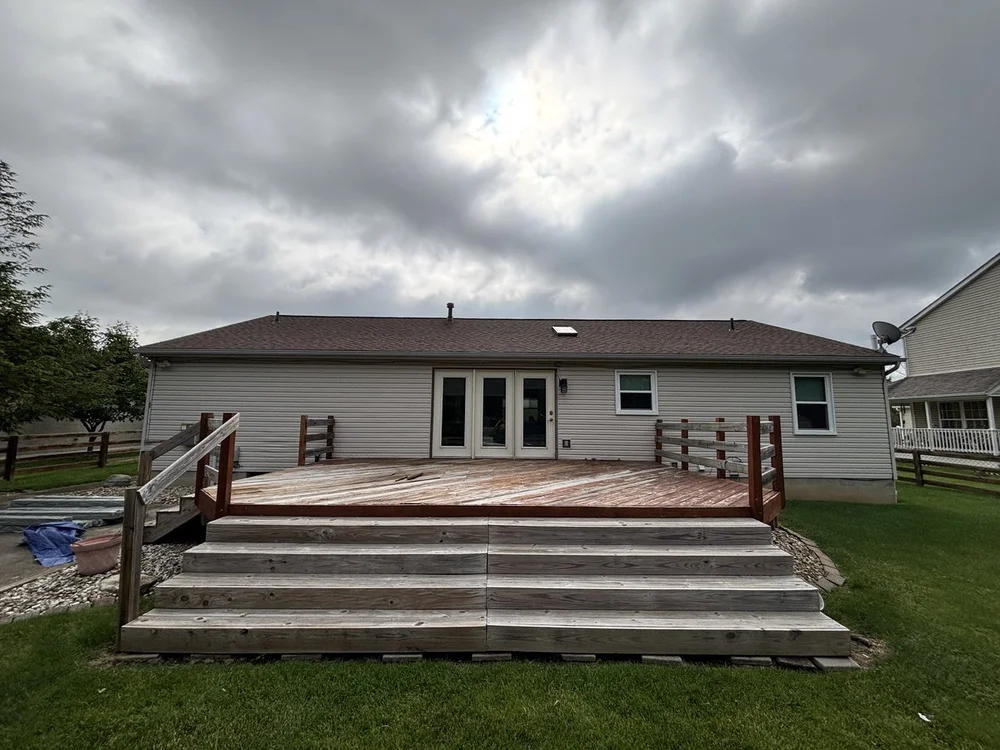 Weathered wood deck before resurfacing