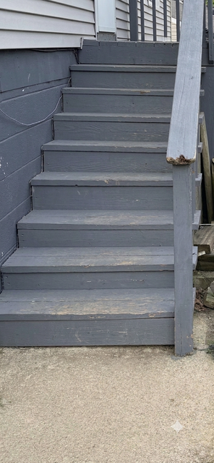 Weathered wood deck before resurfacing