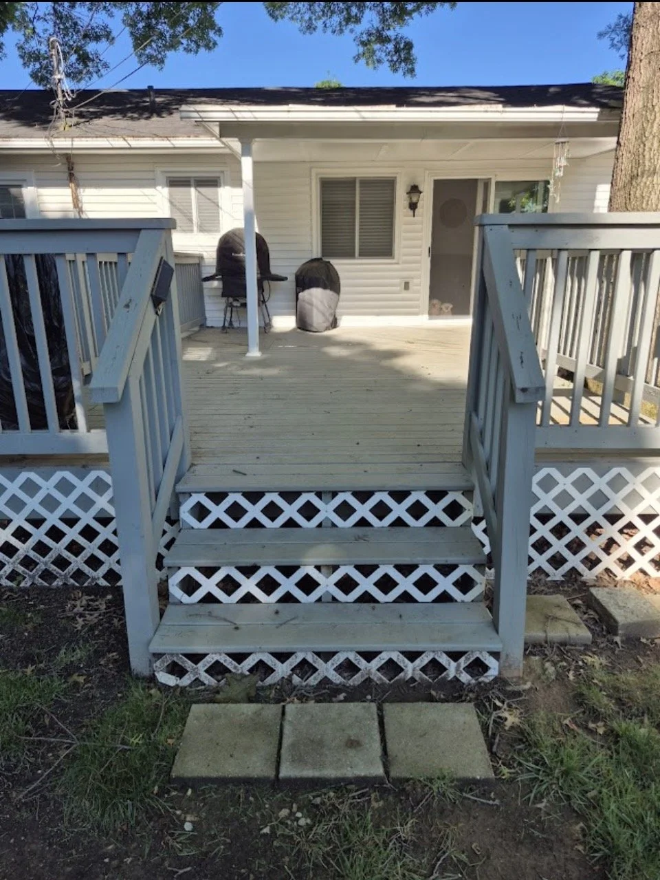 Weathered wood deck before resurfacing