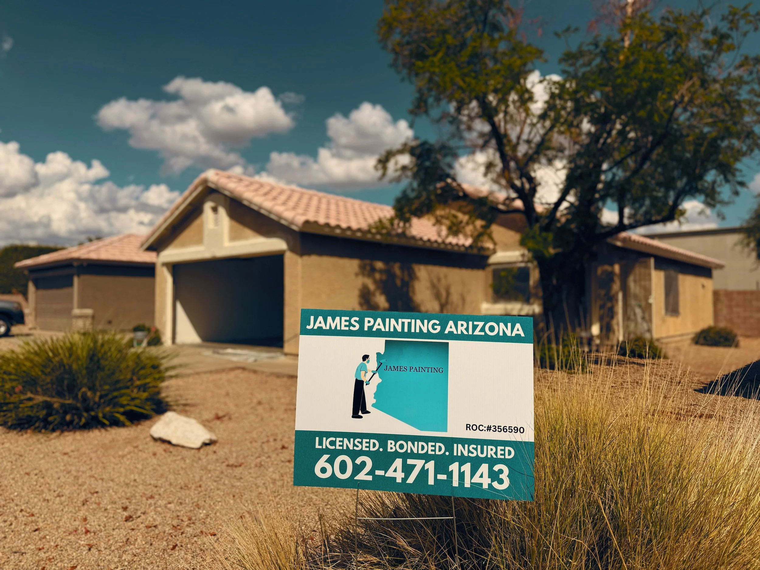 James Painting Arizona yard sign in front of a freshly painted Peoria home exterior — licensed, bonded, insured local painters providing high-quality residential painting across Arizona.