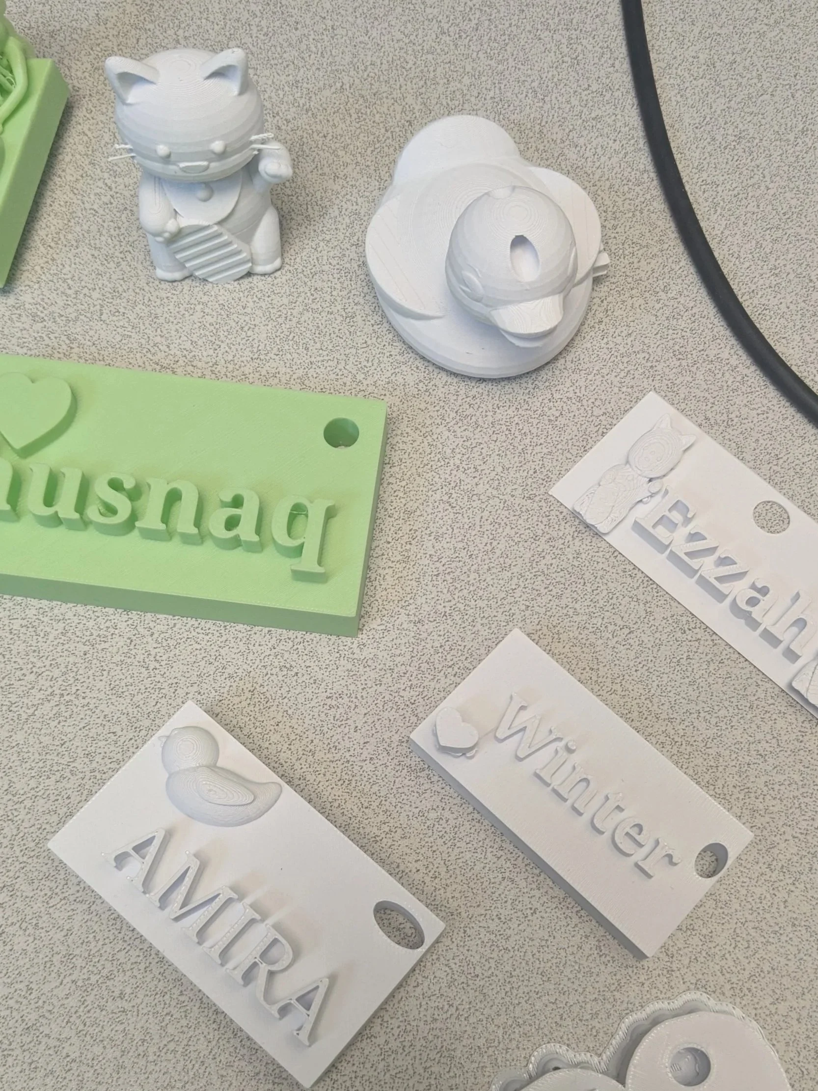 Girl Scouts creating 3D printed designs in a Brain Busters STEM class