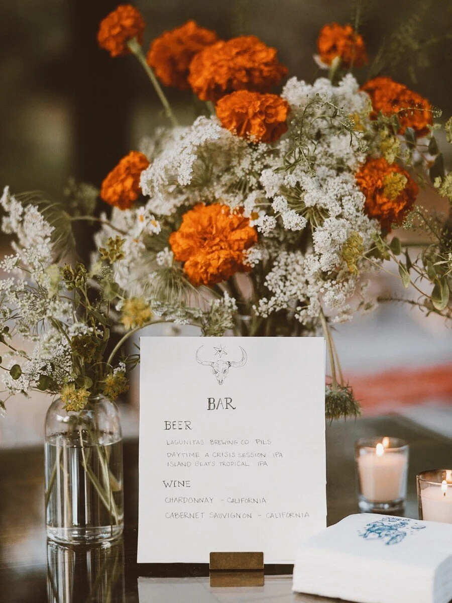 Outdoor wedding ceremony setup at Deloro Valley with elegant floral arrangements