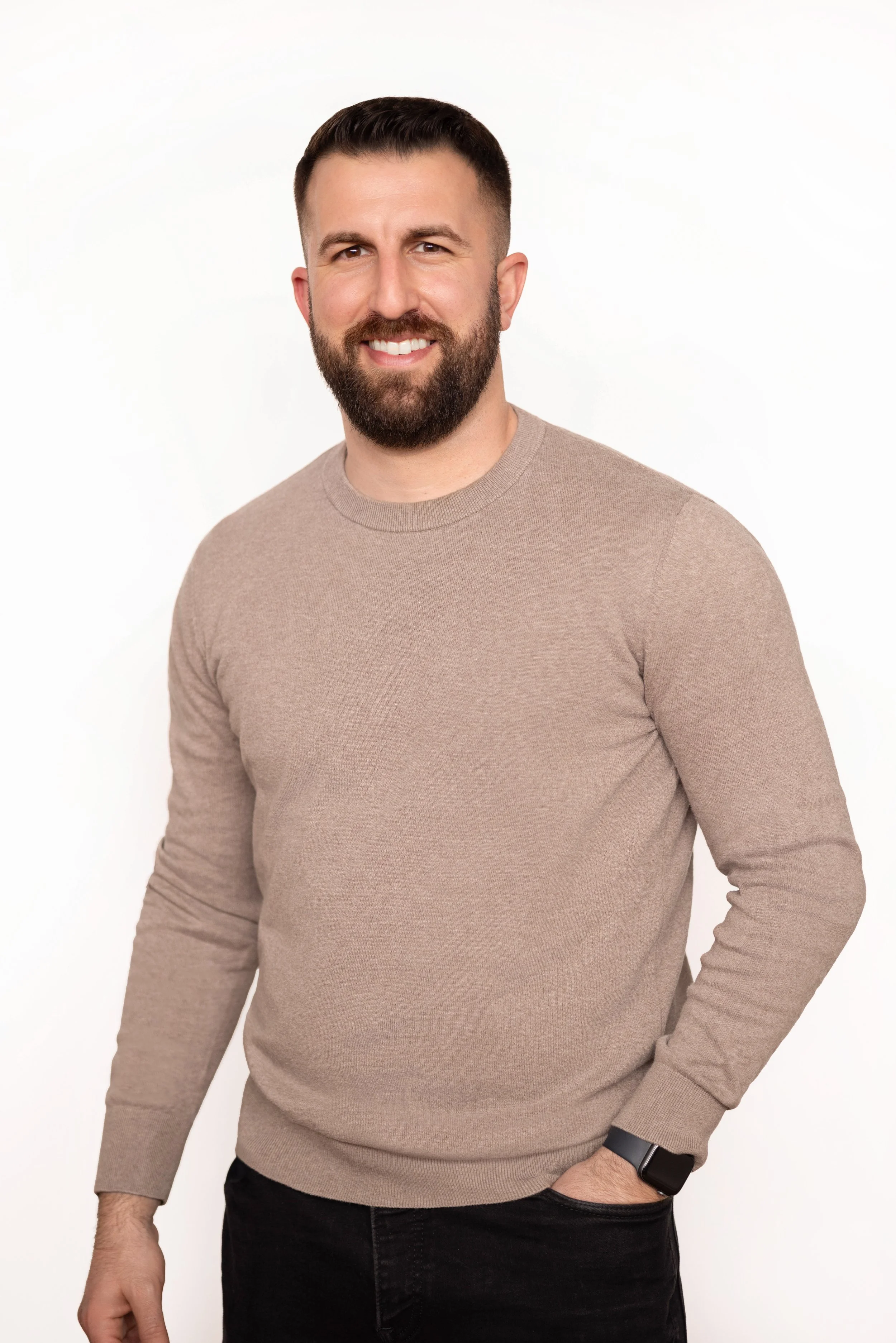 Professional business headshot of a tech professional in the AI industry photographed in a studio setting