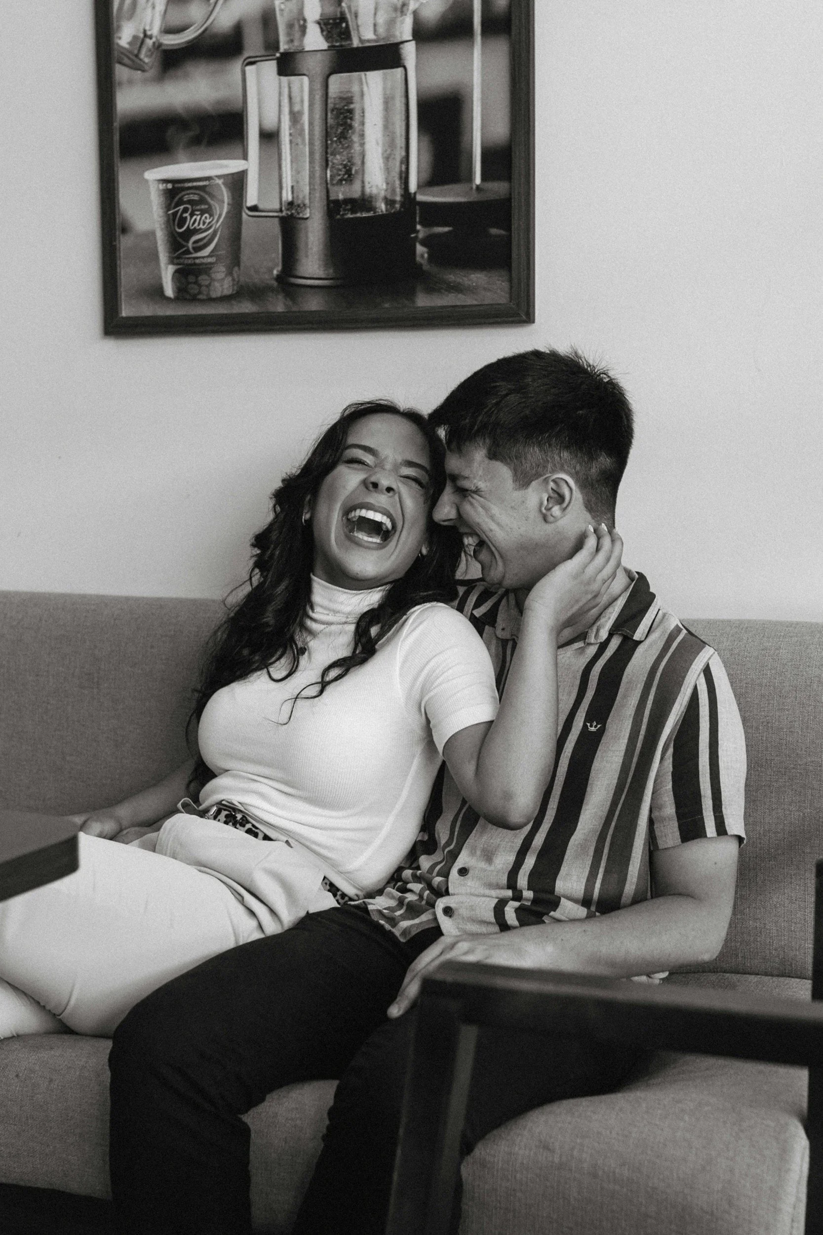 Lifestyle couple photography in San Diego capturing joyful, candid connection at home