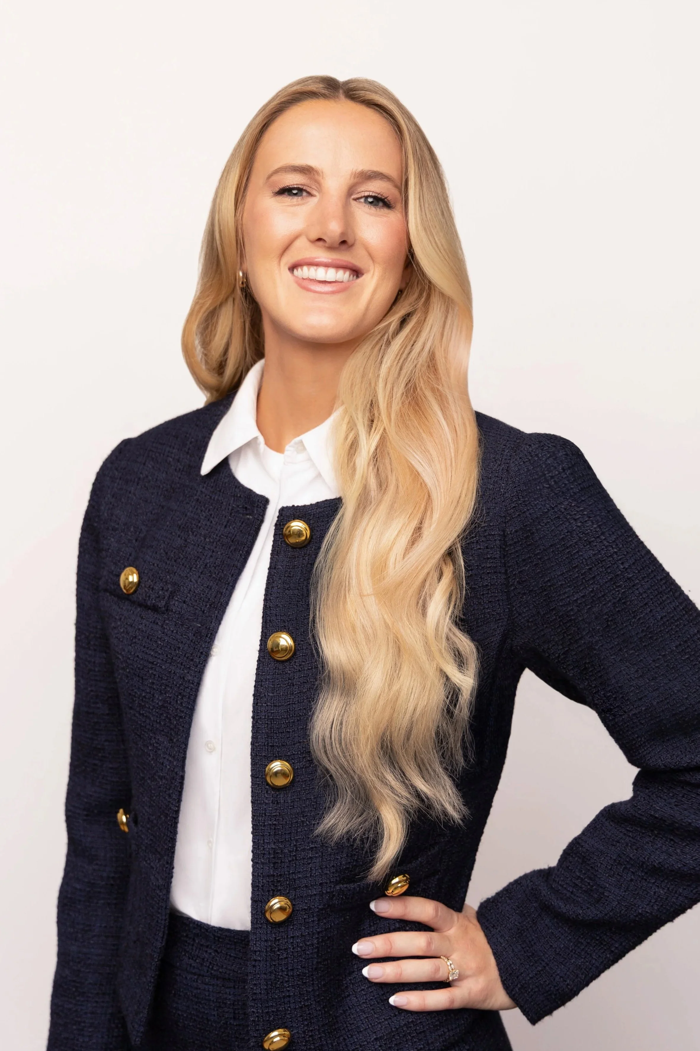 Professional headshot of a flight attendant photographed in Los Angeles with a polished, business-ready look